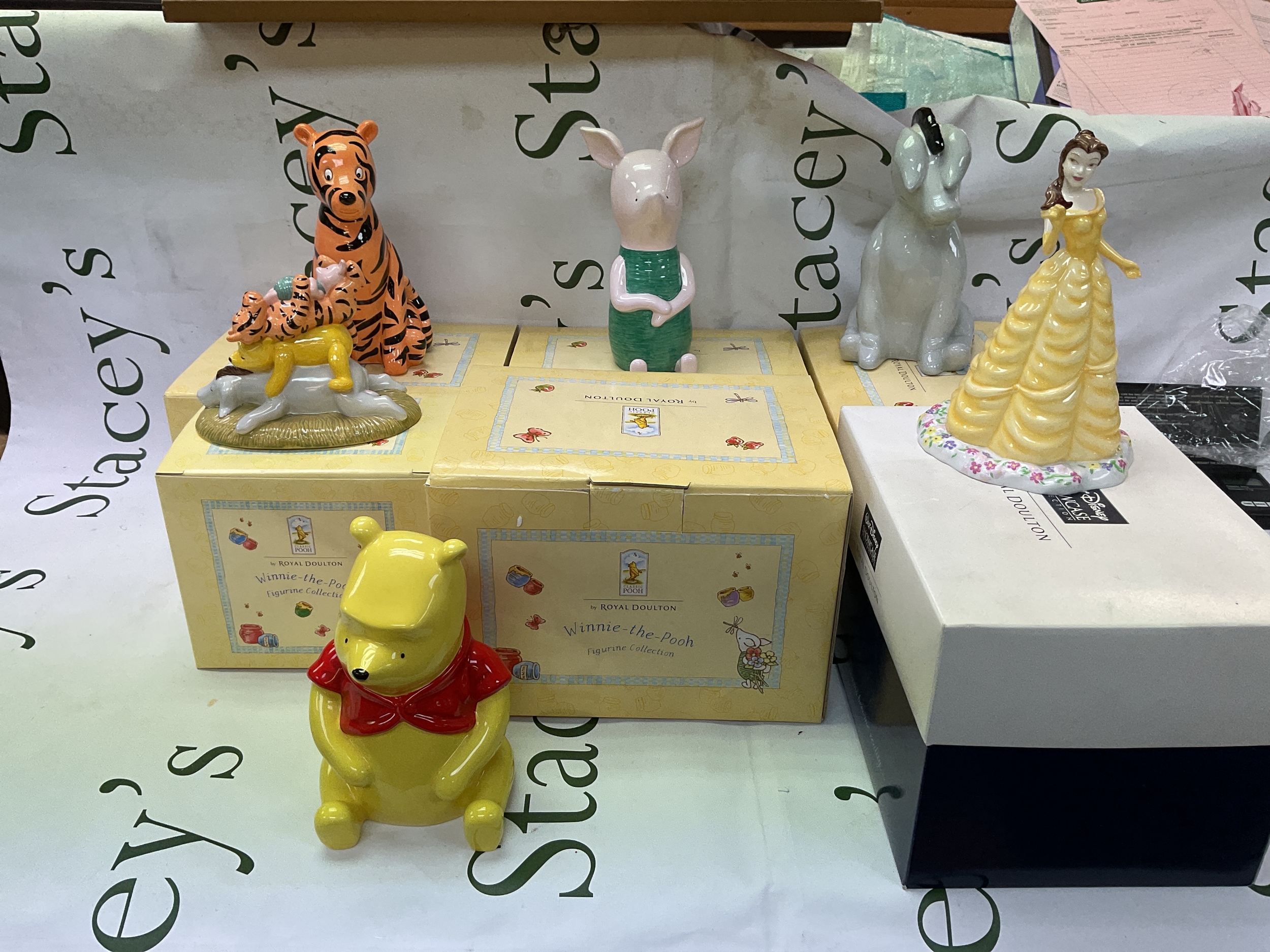 5 boxed Doulton Winnie The Pooh figures and 1 Disney Royal Doulton figure