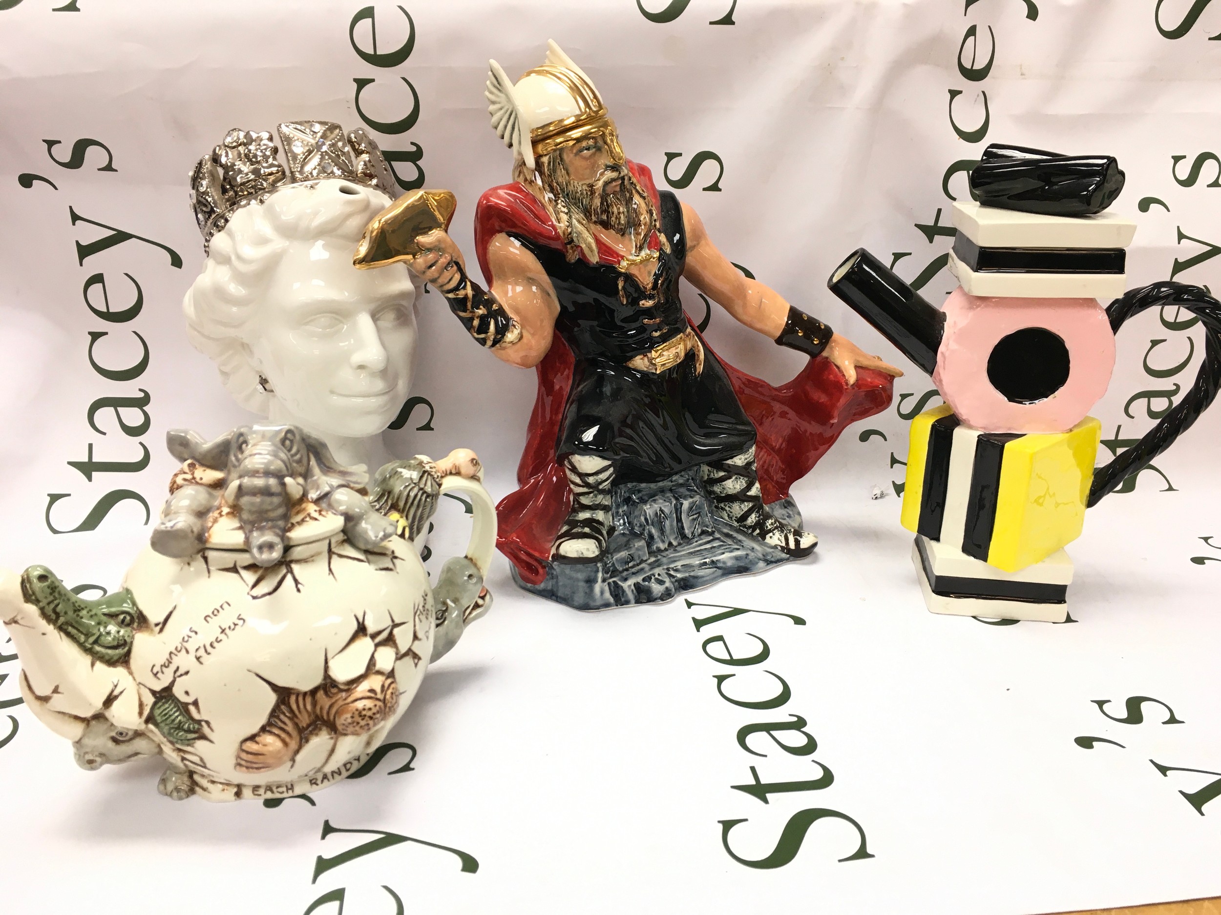 Four ceramic tea pots including Cardew Sweet revenge, Gary Seymour Thor 5/50, Cardew Jewel Queen 119/125 signed Paul Cardew, Harmony and cardew animal tea pot.