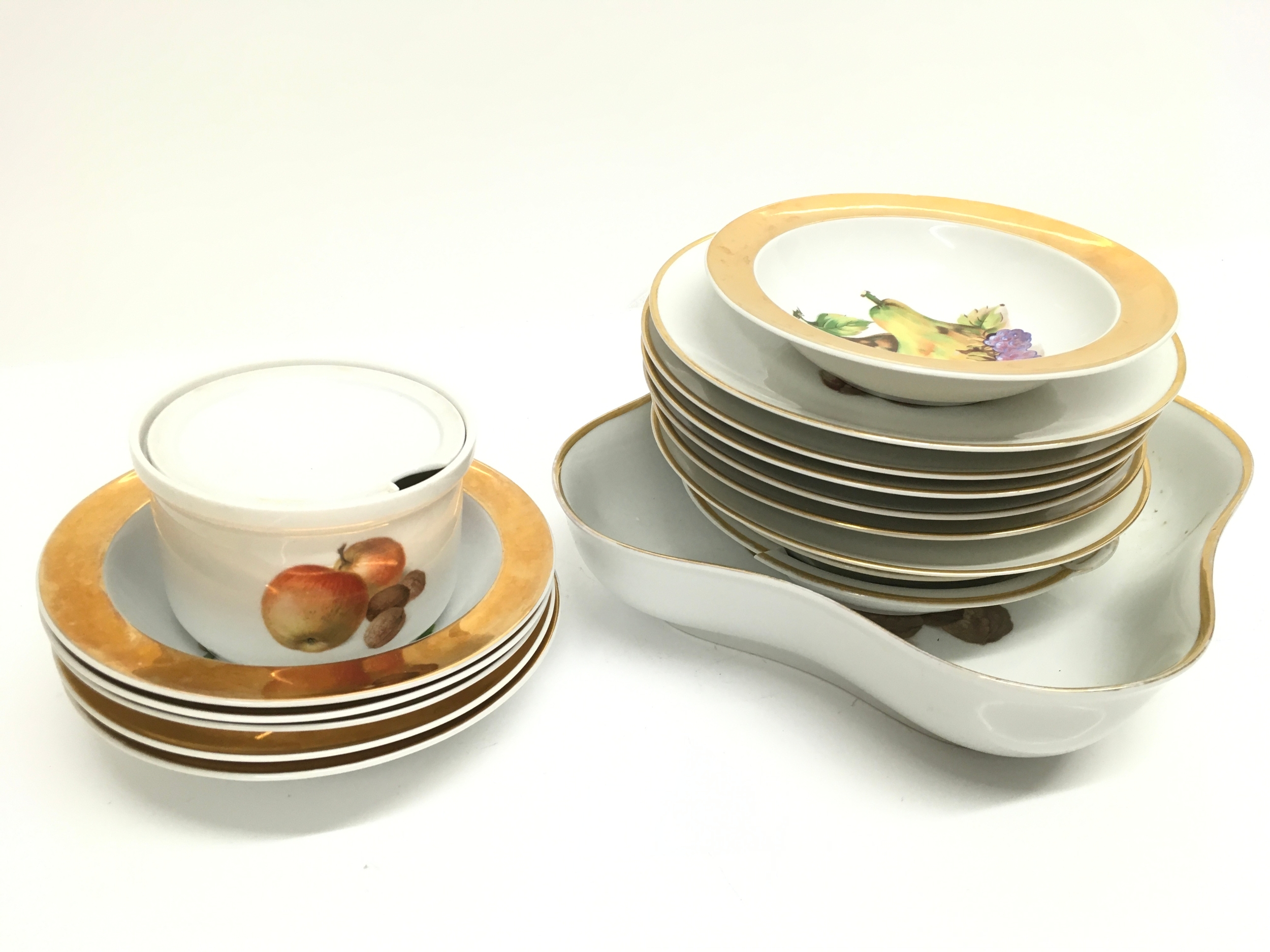 A Bavaria & Czech fruit decorated tea service includes plates , bowls