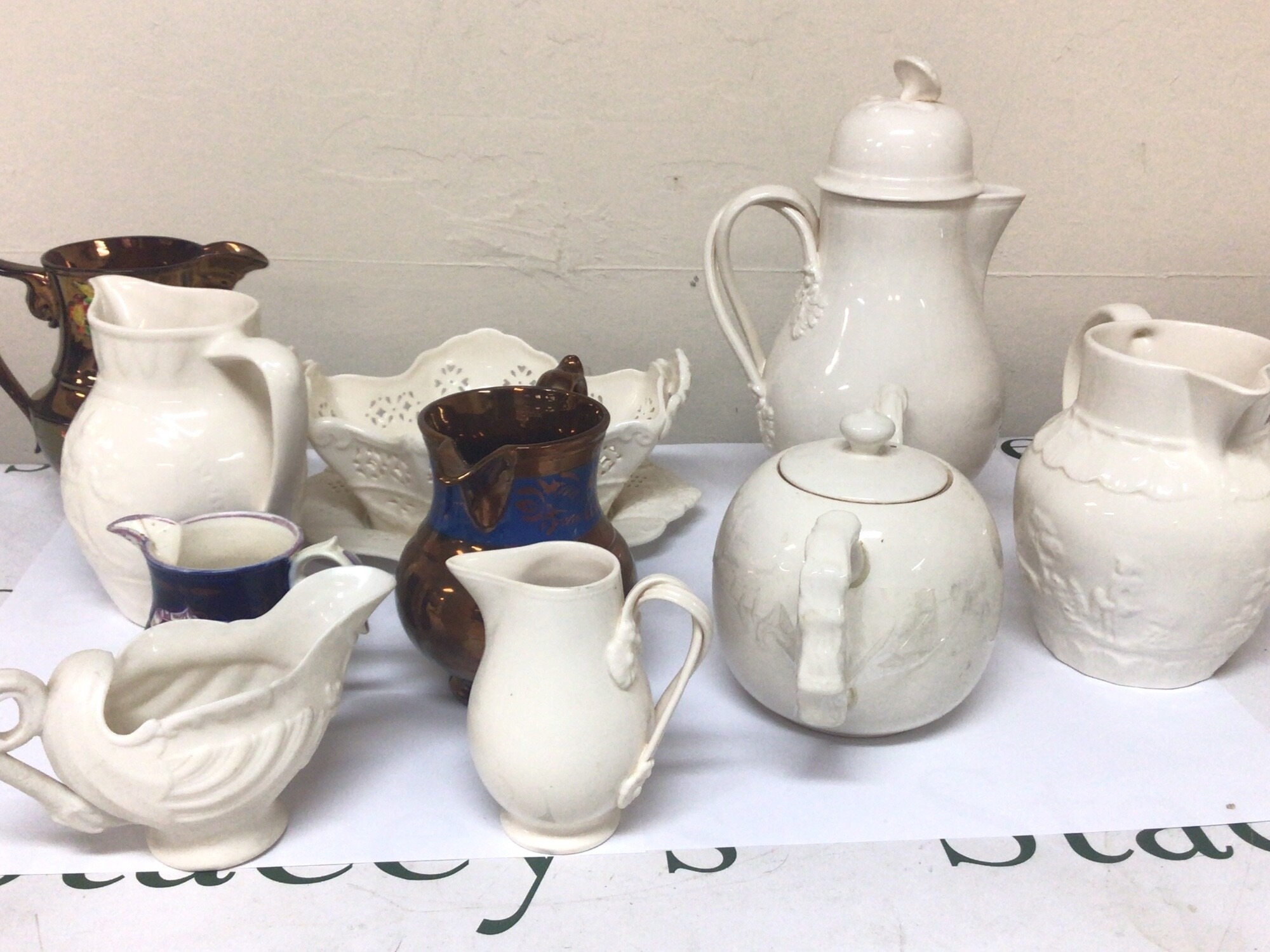 A collection of late 19th century lustre jugs and 20th century Hartley Greens Leeds creamware ceramics (a lot) NO RESERVE