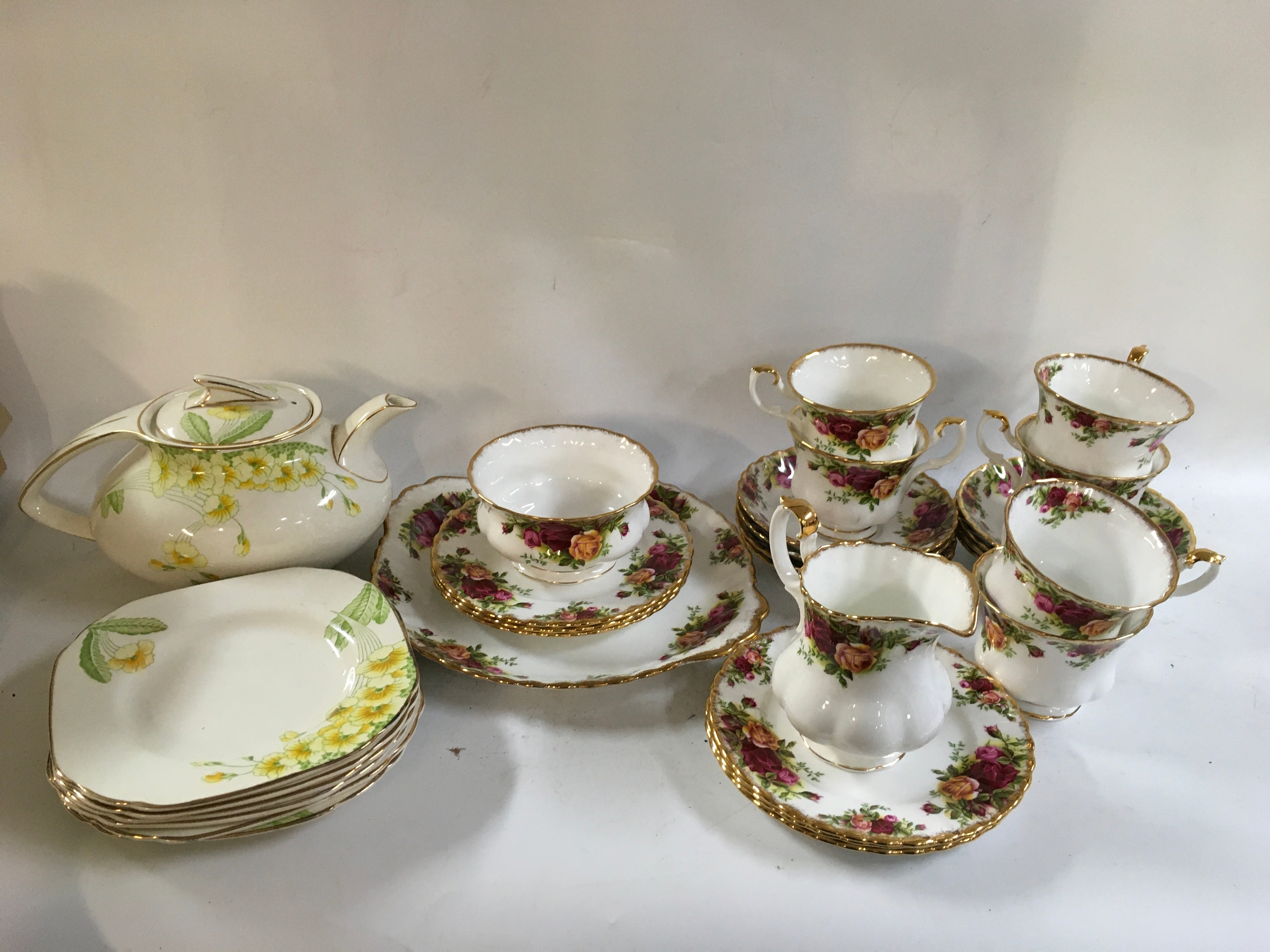 Royal Albert tea set with additional Sunderland Ware plates and a jug