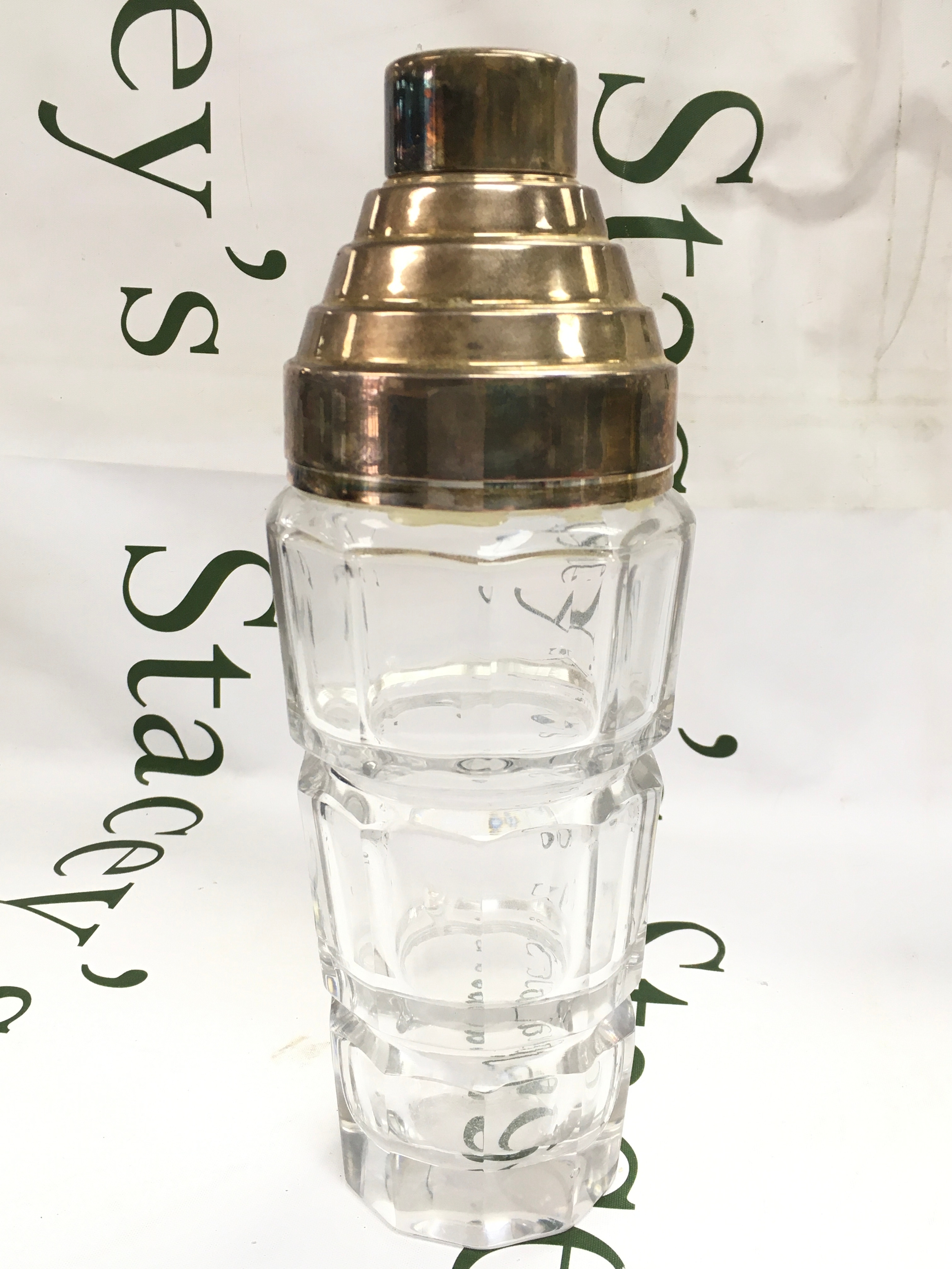 An Art Deco glass and chrome Cocktail shaker, 26cm tall