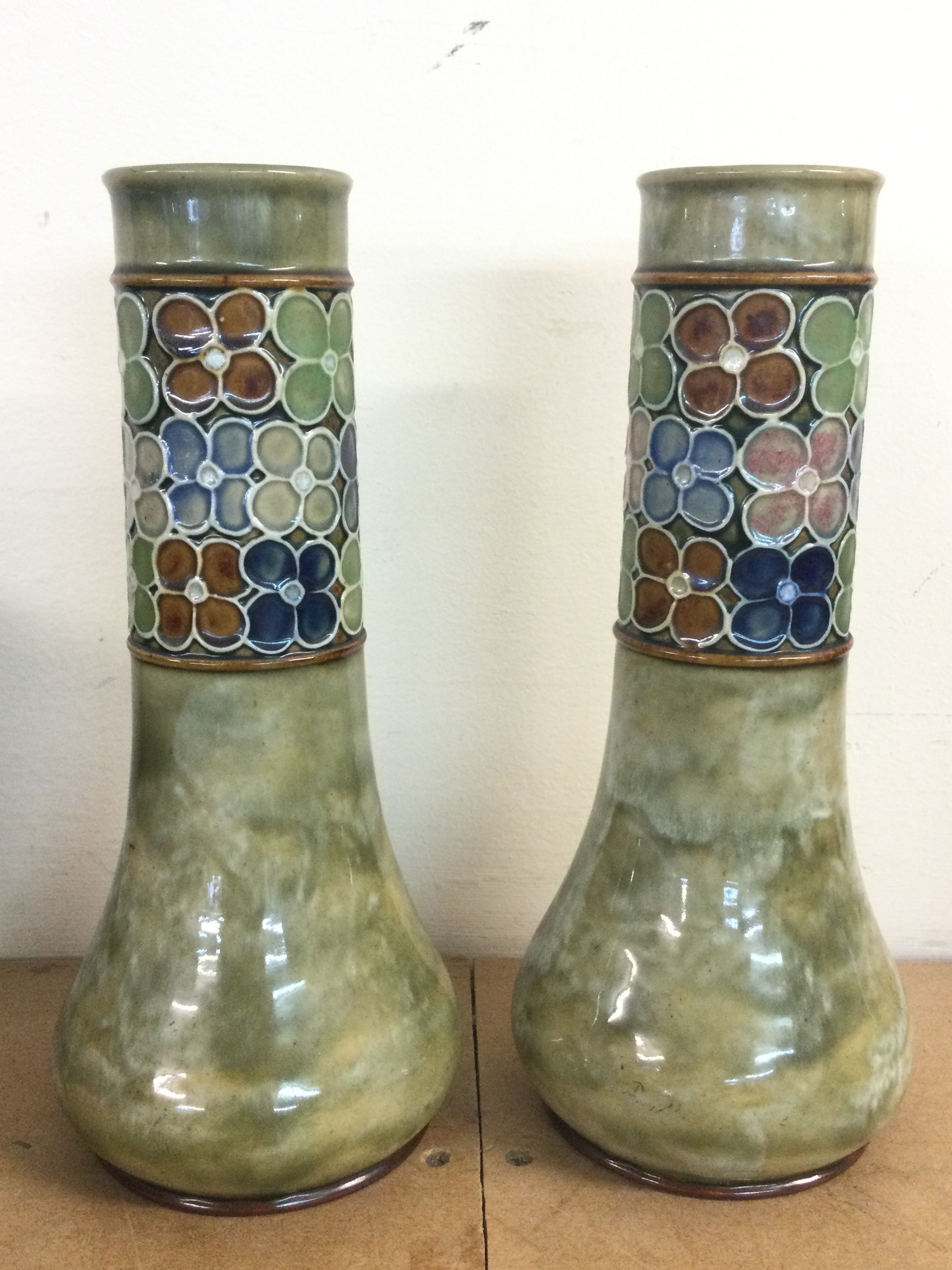 A pair of ceramic Royal Doulton vases , 26cm tall
