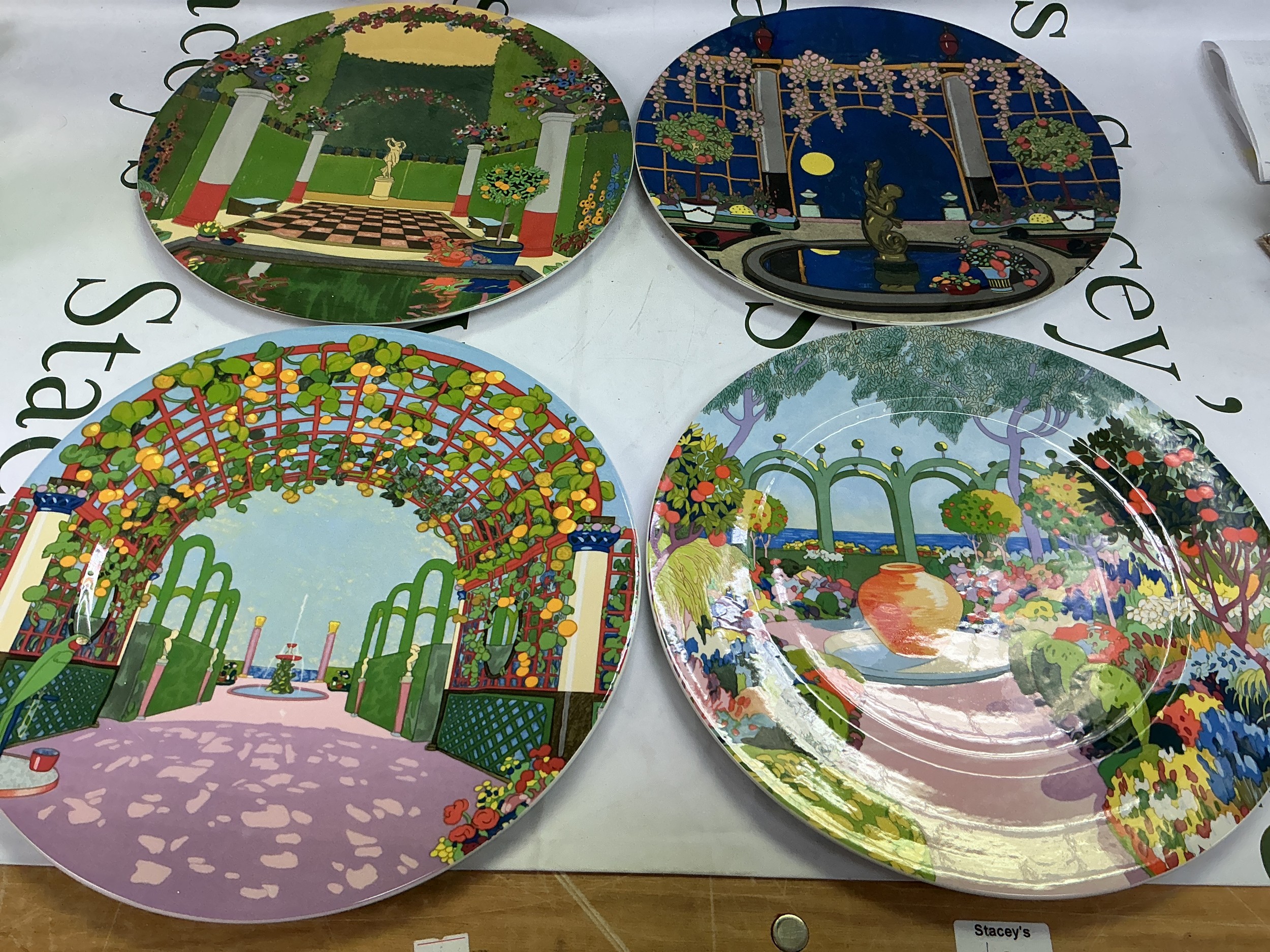 Six Villeroy & Boch cabinet plates comprising four from the Jardins Francais range plus two of The Dower House. Largest diameter approx 30.5cm.