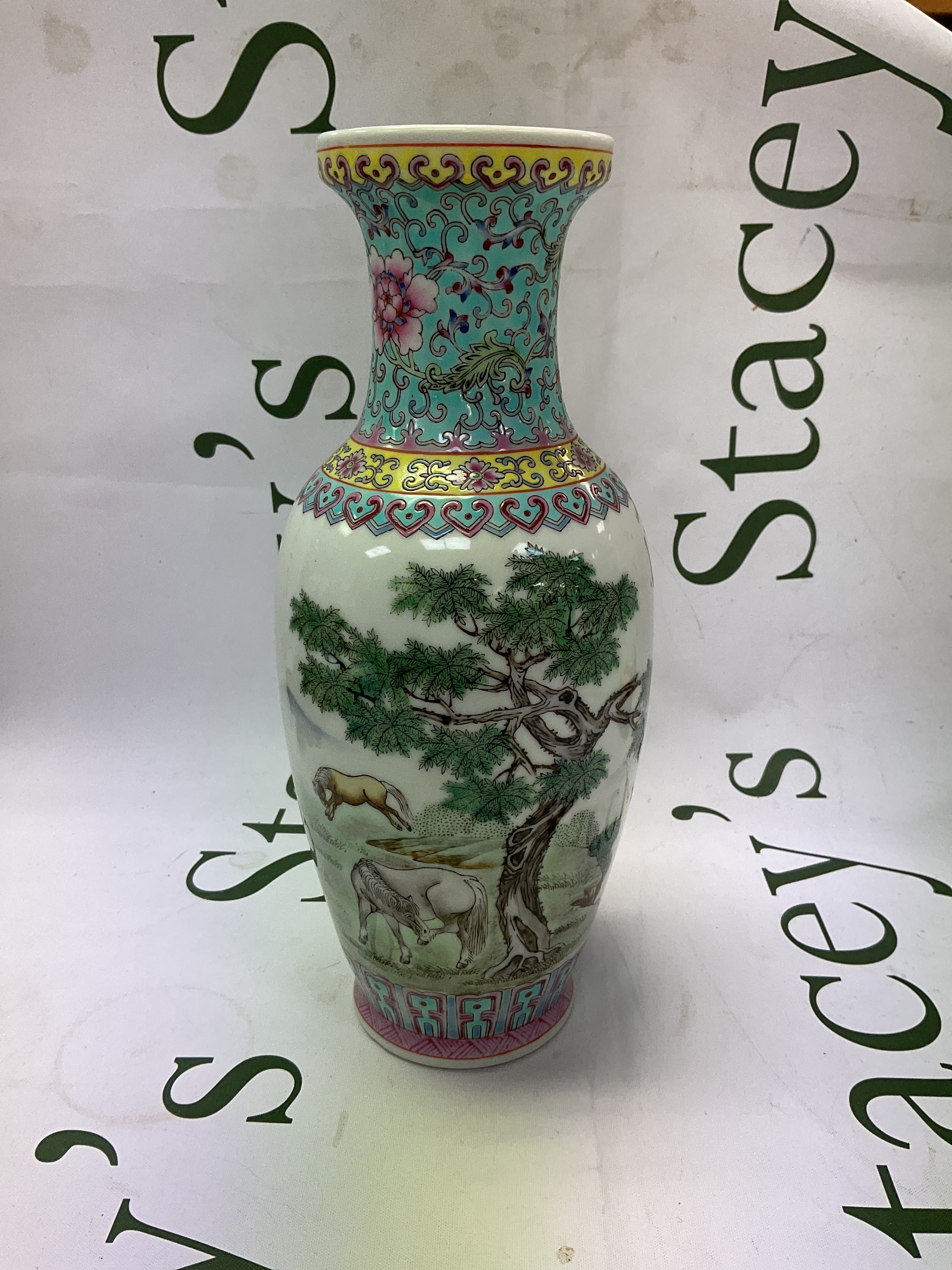 Republic Chinese vase with horses under a tree with a mountainous background, additional verse applied in the form of a poem  "green waters and blue mountains form a scenic view fine suburban fields and plain where fine steeds joyfully roam around at leisure " and lustre to the glaze. H 25.5 cm.