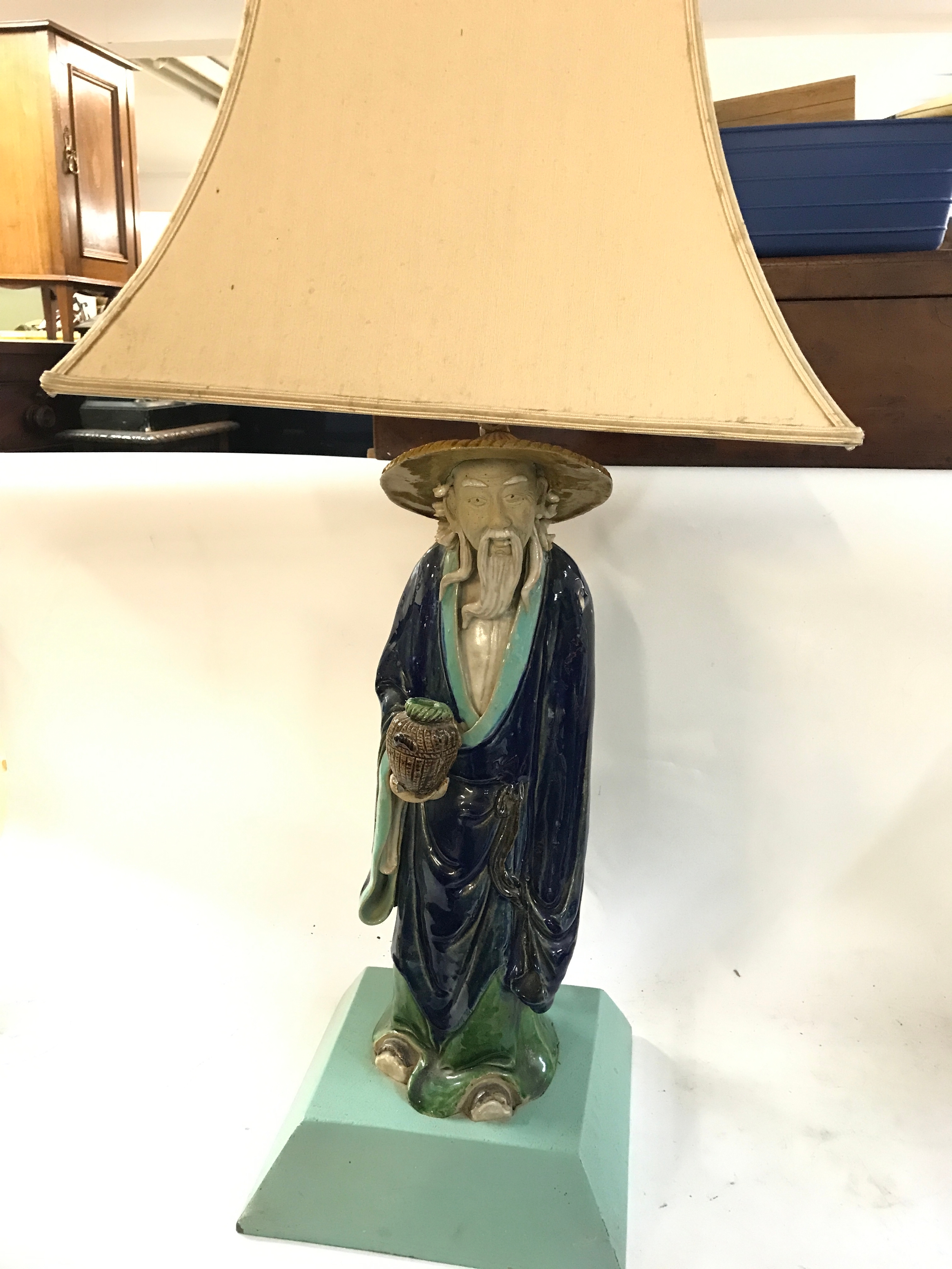 Chinese Shiwan (Shekwan) pottery mudman figurine lamp features a glazed sage or fisherman wearing a traditional straw hat and carrying a basket., 72cm tall NO RESERVE