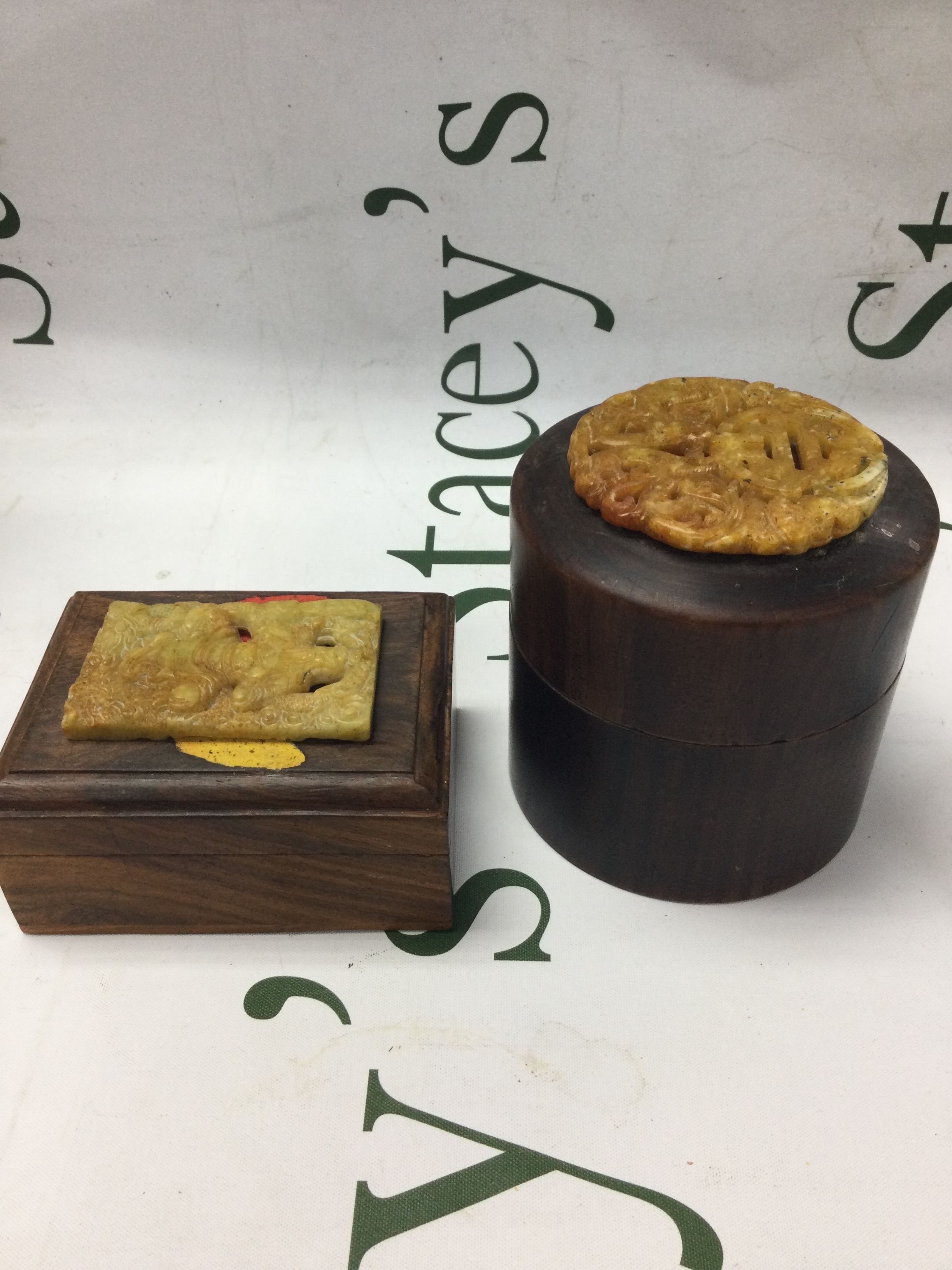 2 Chinese hardwood boxes with pierced Jade on the lid