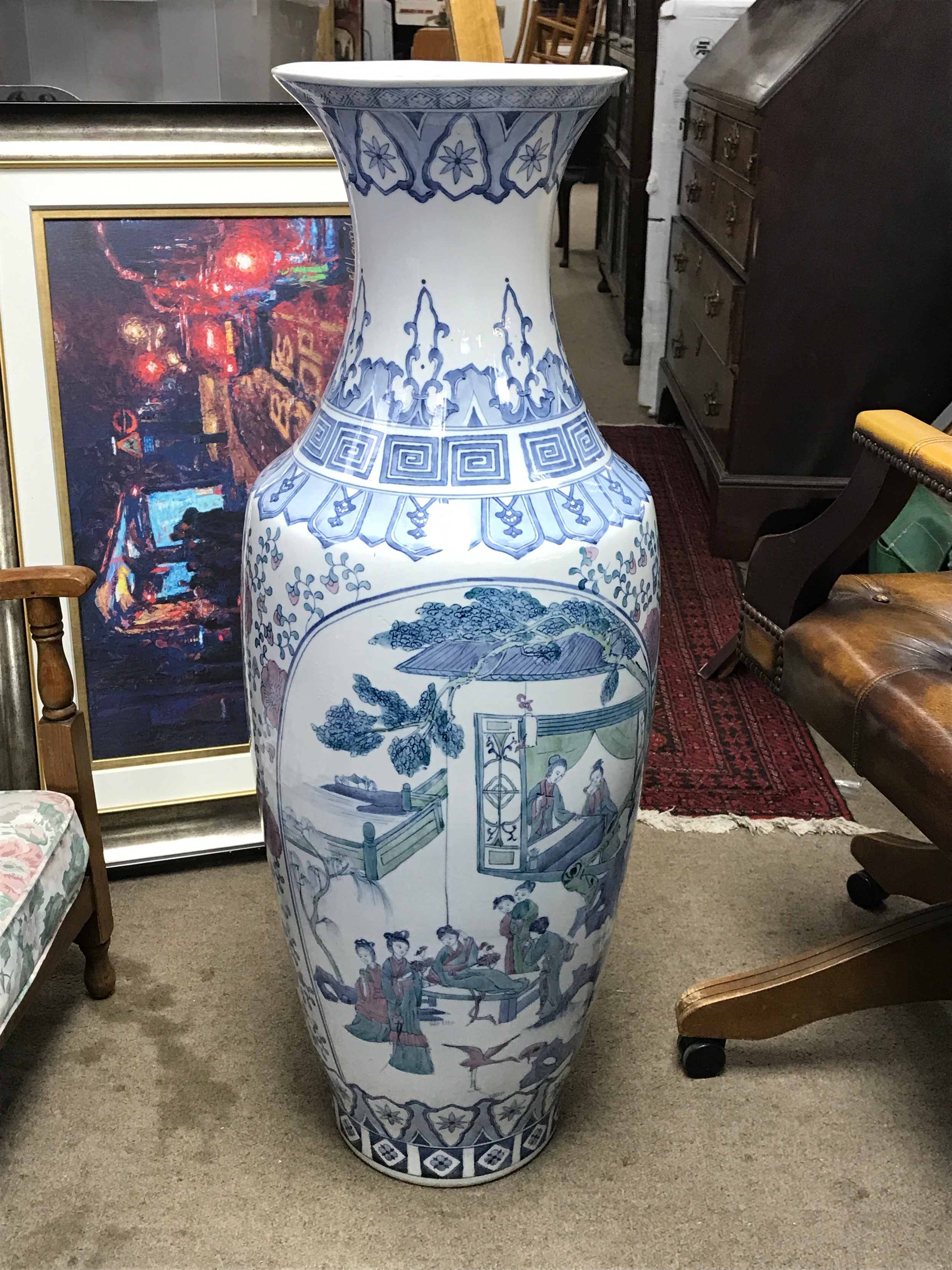 A Chinese floor vase featuring traditional figural landscape scenes. 94cm tall