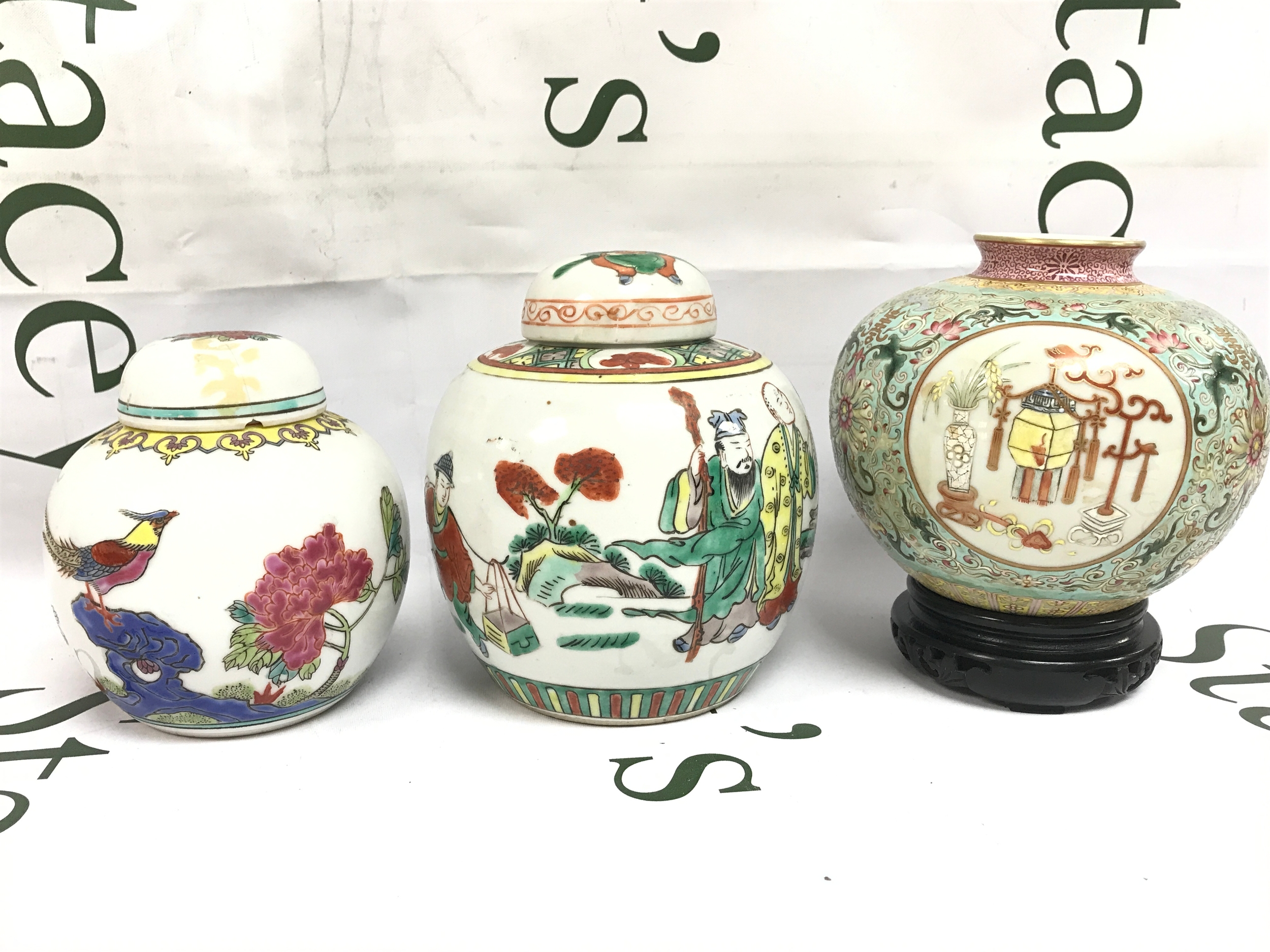 Three Chinese ginger jars. 13 to 15cm tall