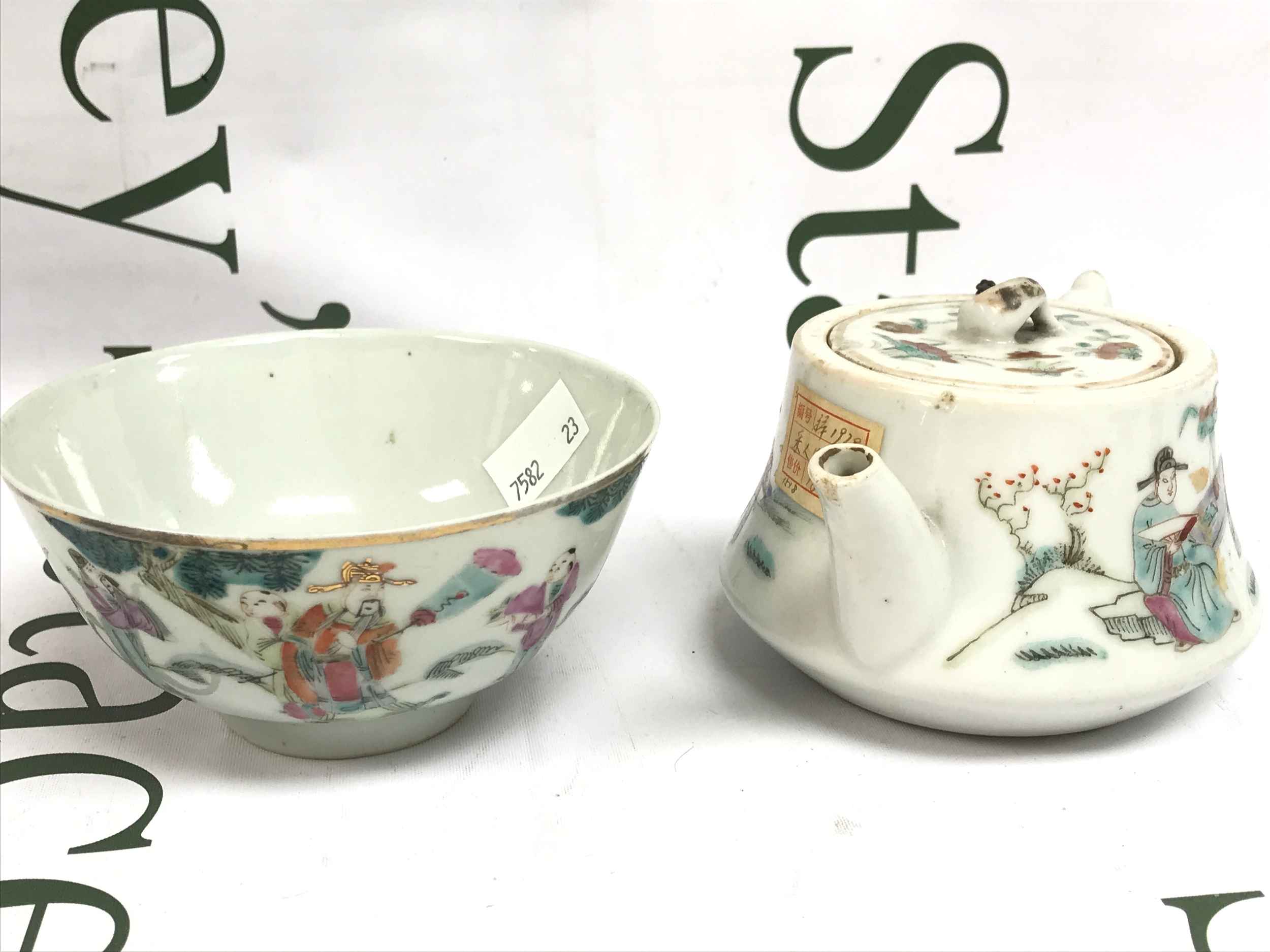 A Chinese porcelain famille rose teapot and a bowl. 6 and 7cm tall