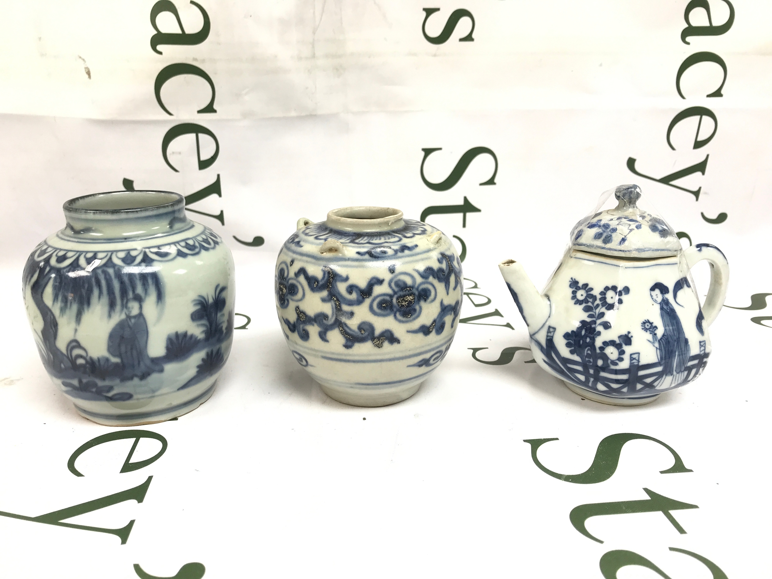 Chinese blue and white porcelain, two vases and a tea pot. 10 to 11cm tall 
