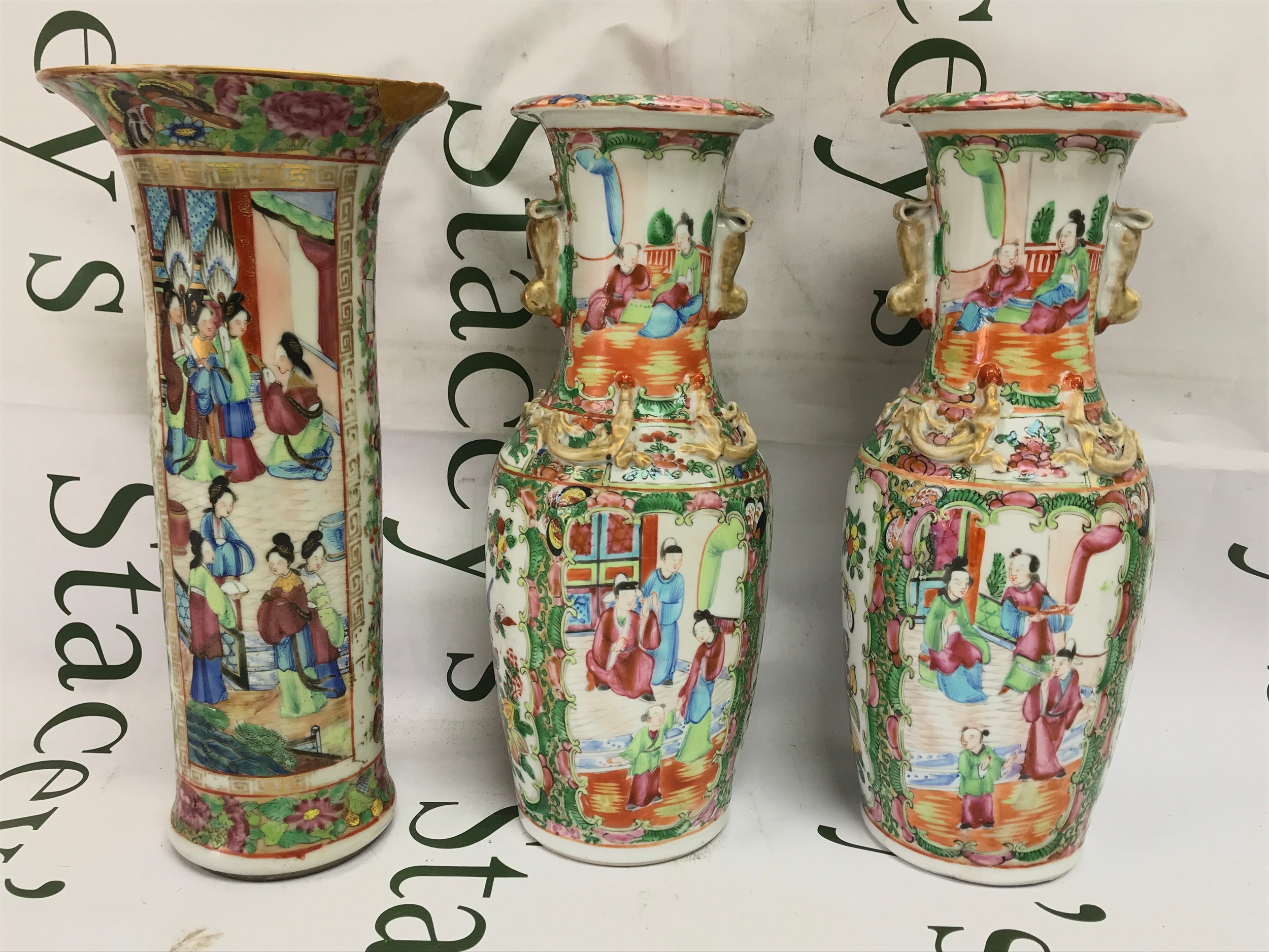 Three Cantonese vases famille rose, damage and restoration. Approx 30cm tall