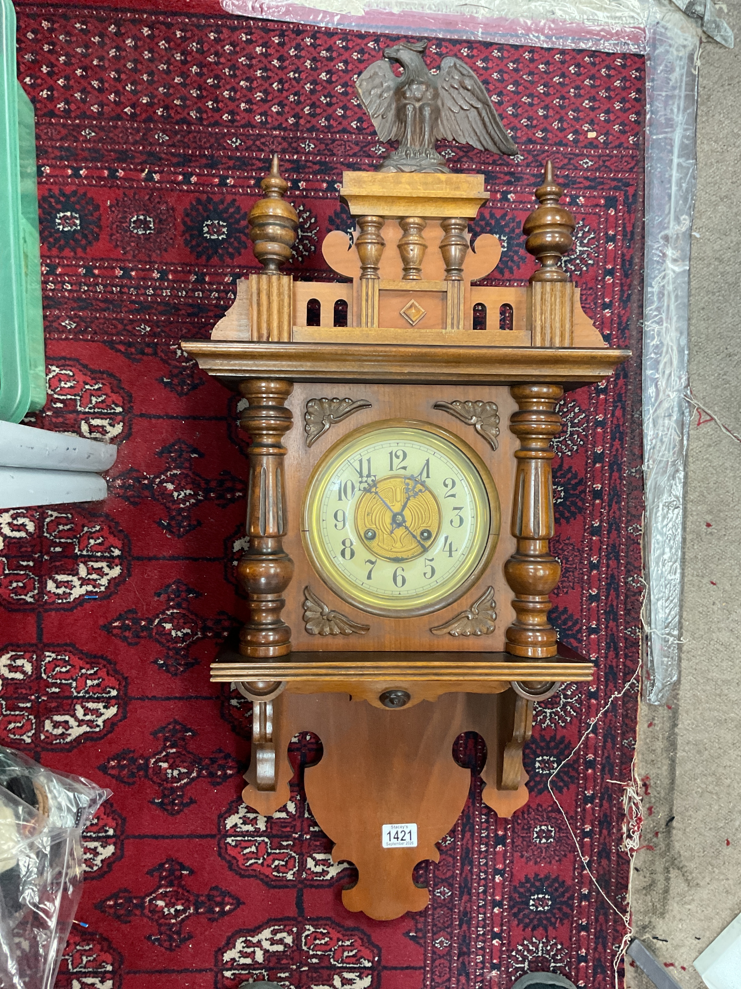Mahogany wall clock 8 day movement.