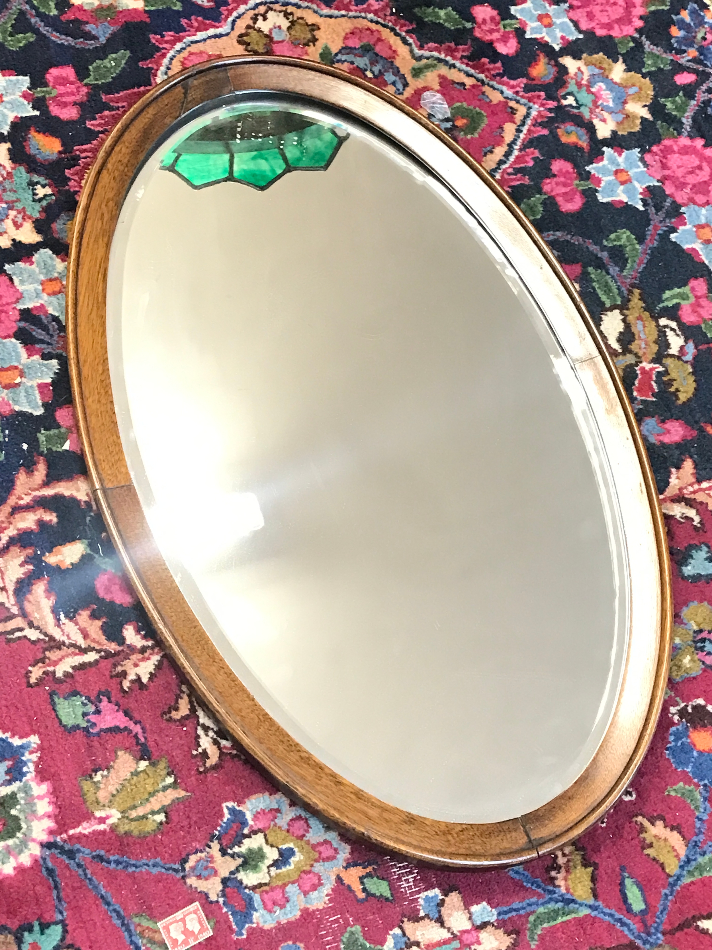 A wall mirror 70cm tall 44cm wide TO BE SOLD WITHOUT RESERVE