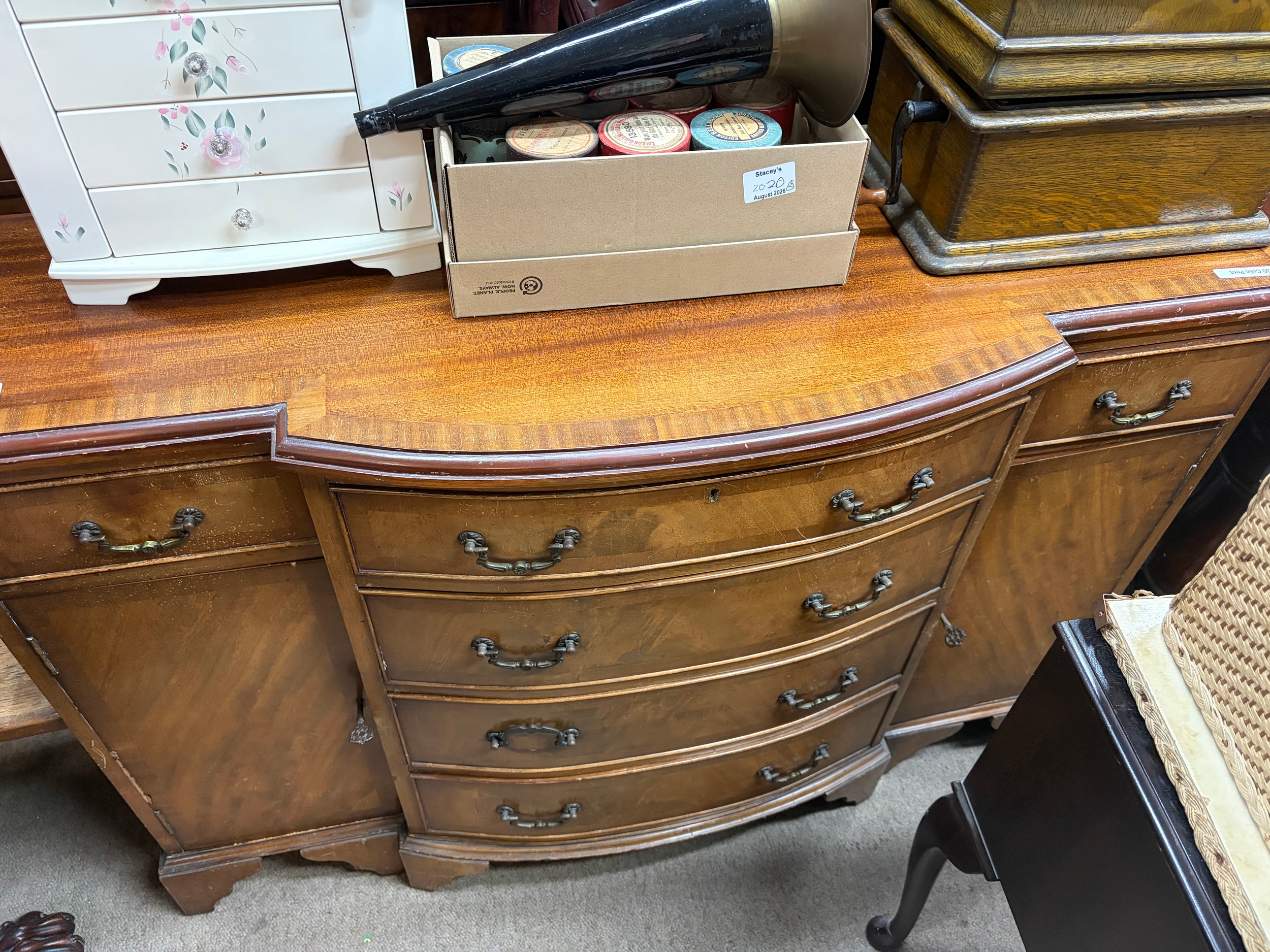 A bow fronted chest of drawers TO BE SOLD WITHOUT RESERVE