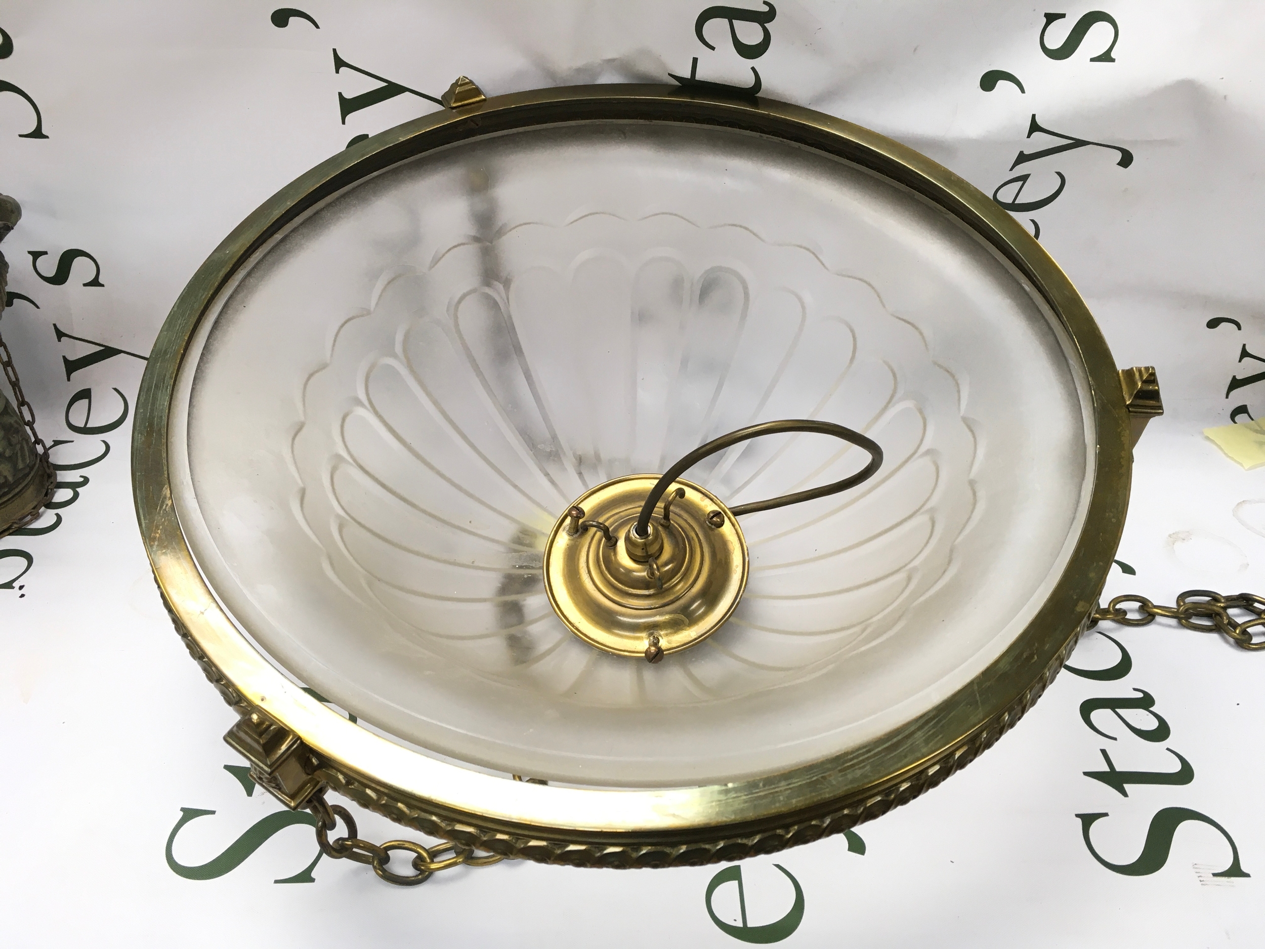 A glass and brass light 
