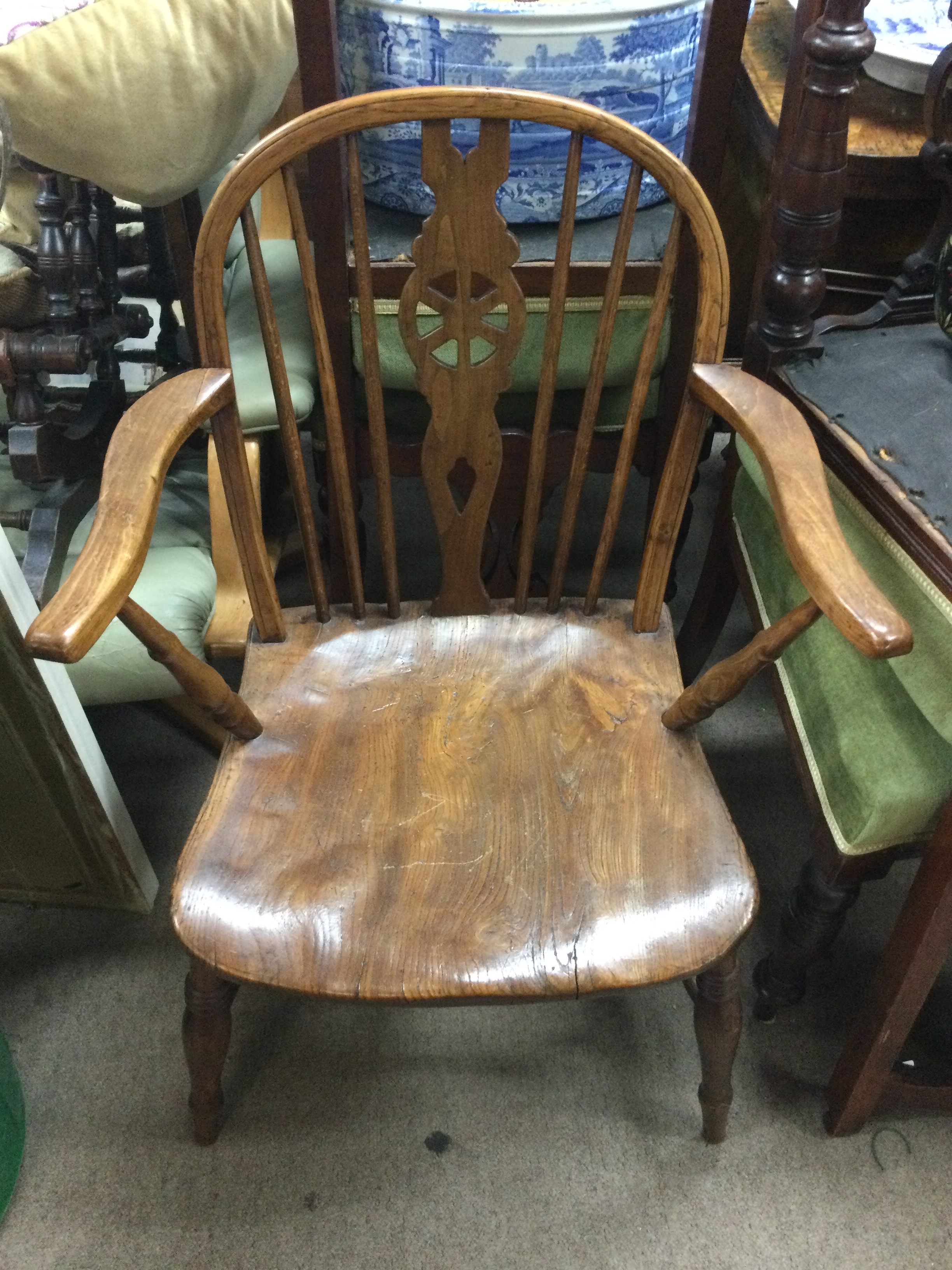 An elm chair 85cm tall, 57cm wide , 46cm wide 
