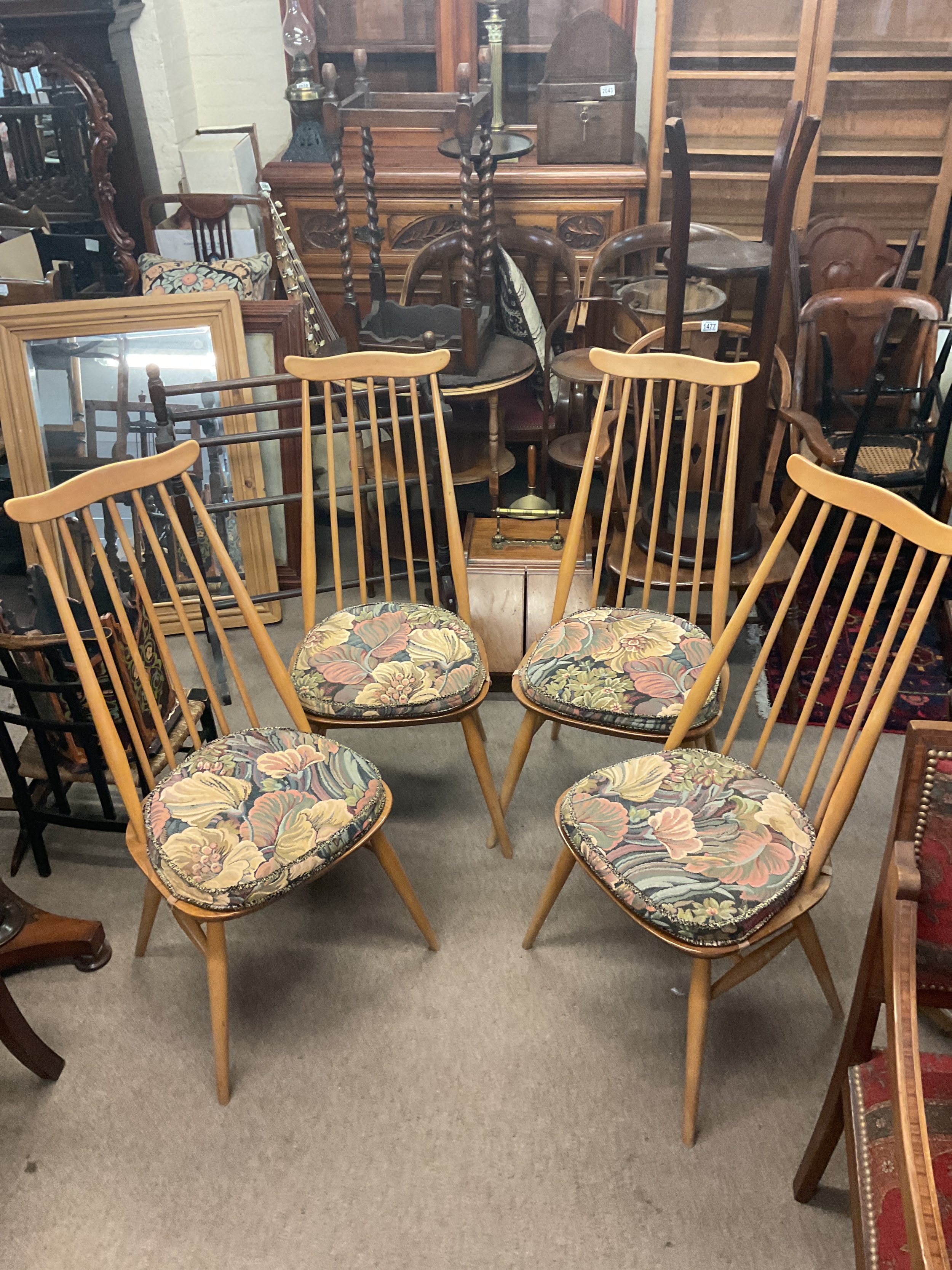 Ercol blonde table and four chairs.