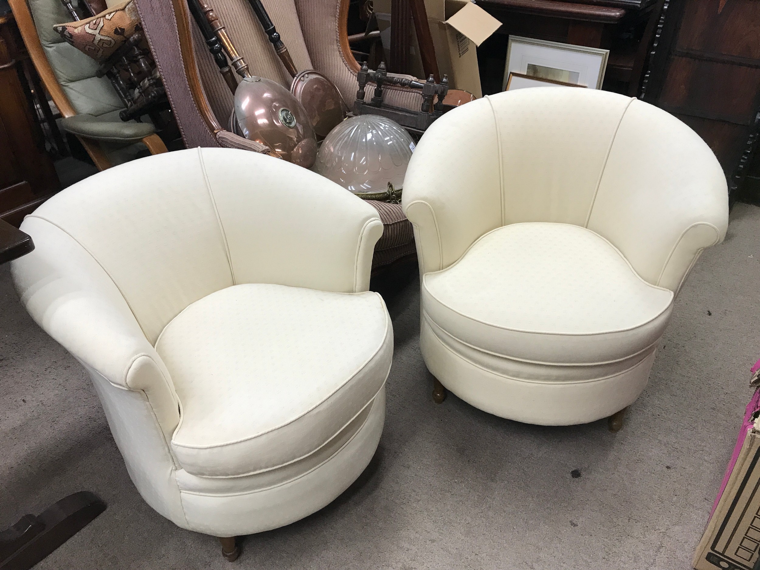 Two cream tub chairs. 65cm wide, 70cm long, 65cm tall approximately