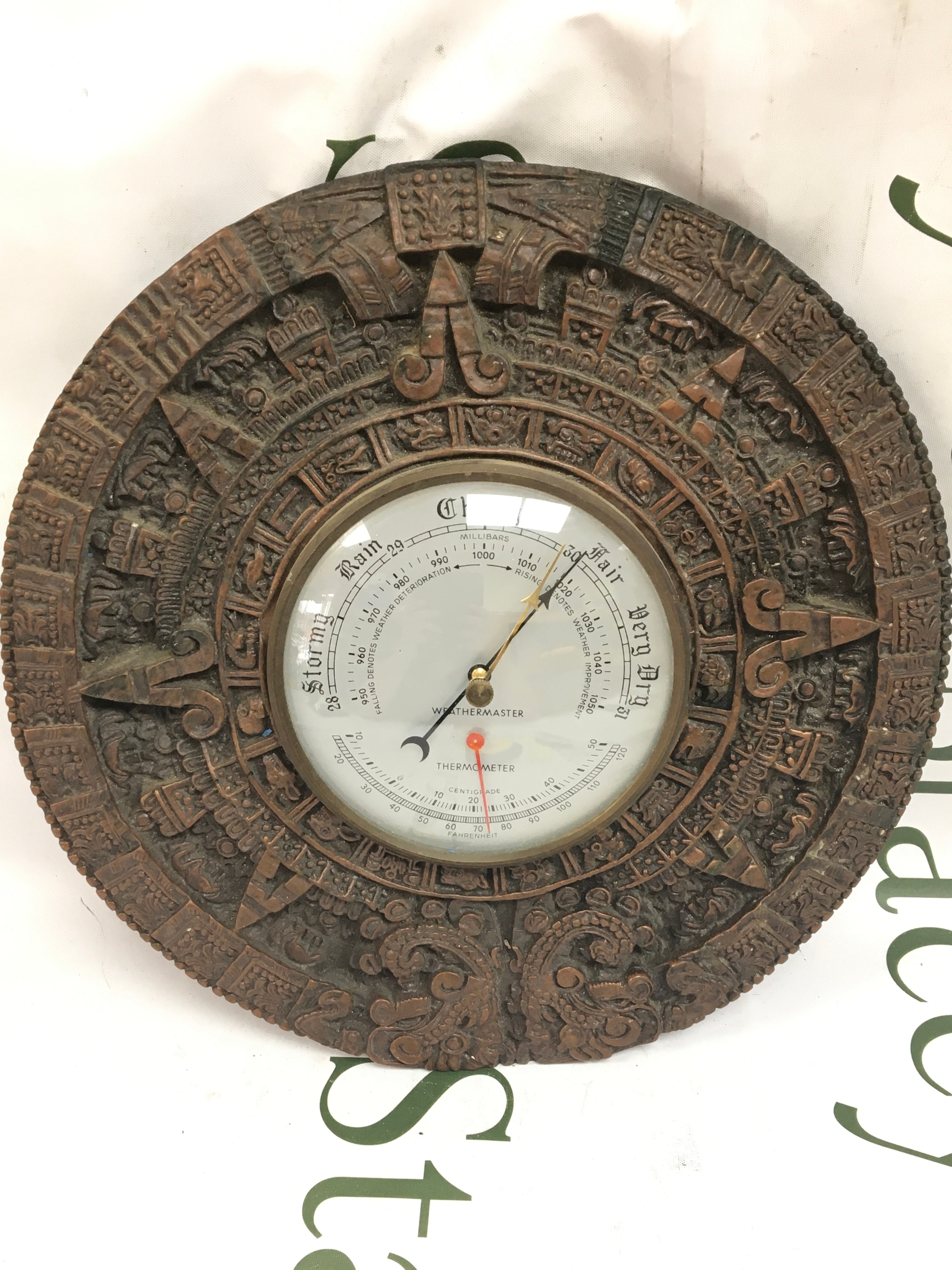 A modern barometer Weathermaster in round case ,Approximately 30cm tall