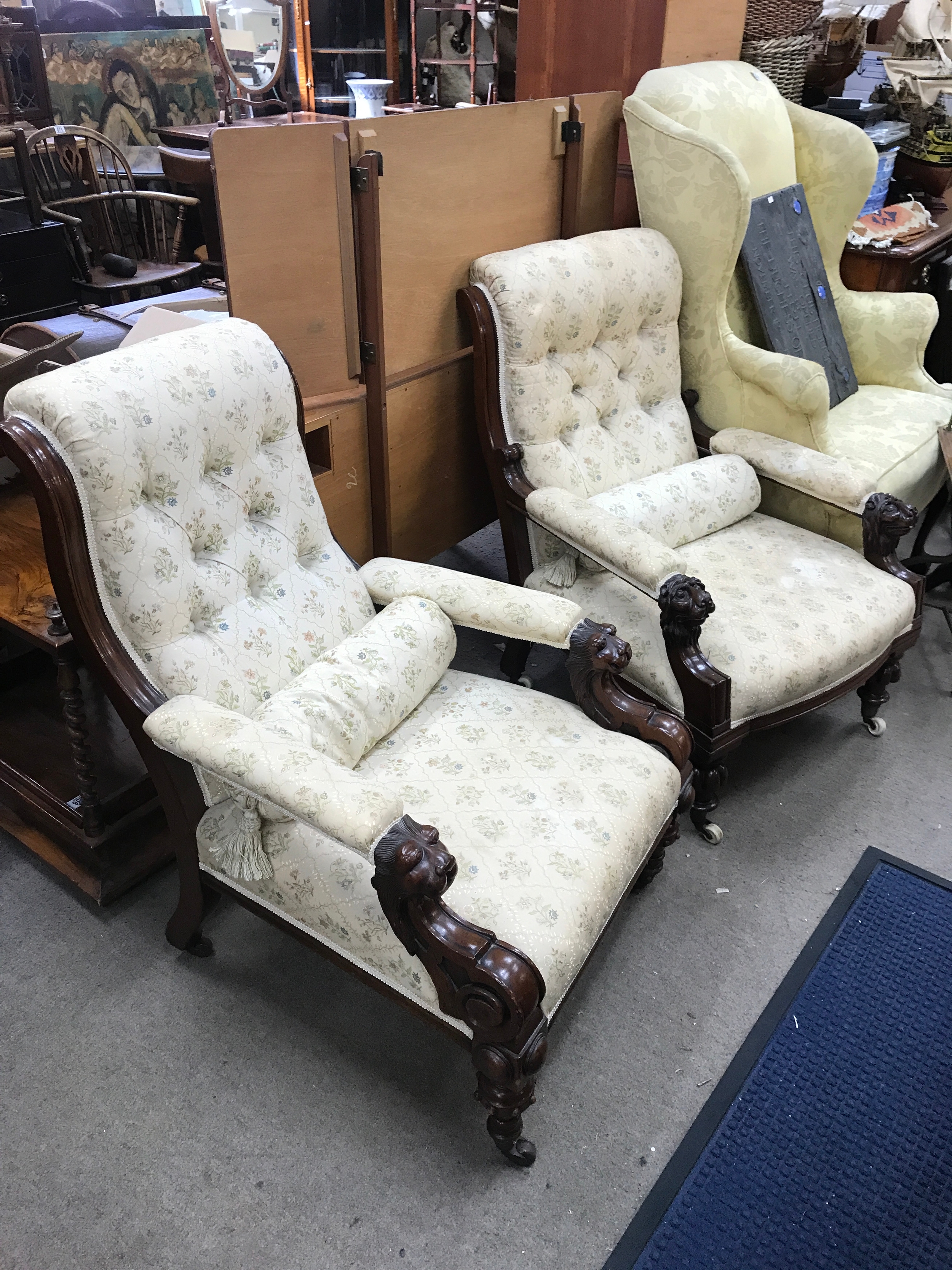 A pair of arm chairs with lion mask carved arm ends 97cm tall, 66cm wide, 70cm long approx