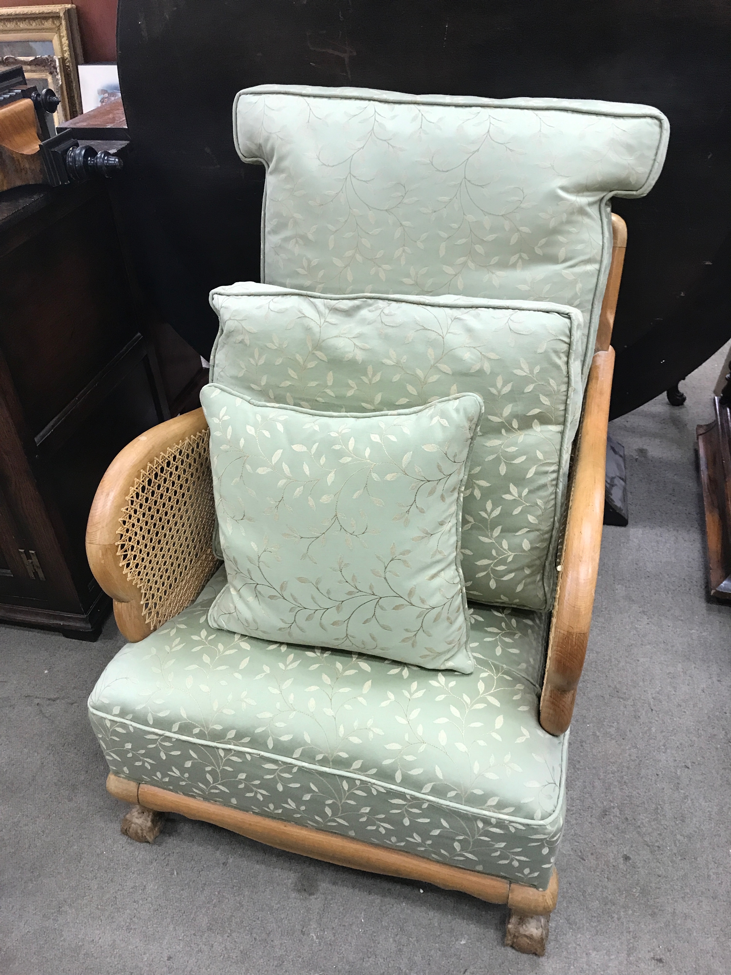 A mid-century bergère-style lounge chairs. 83cm tall, 65cm wide 