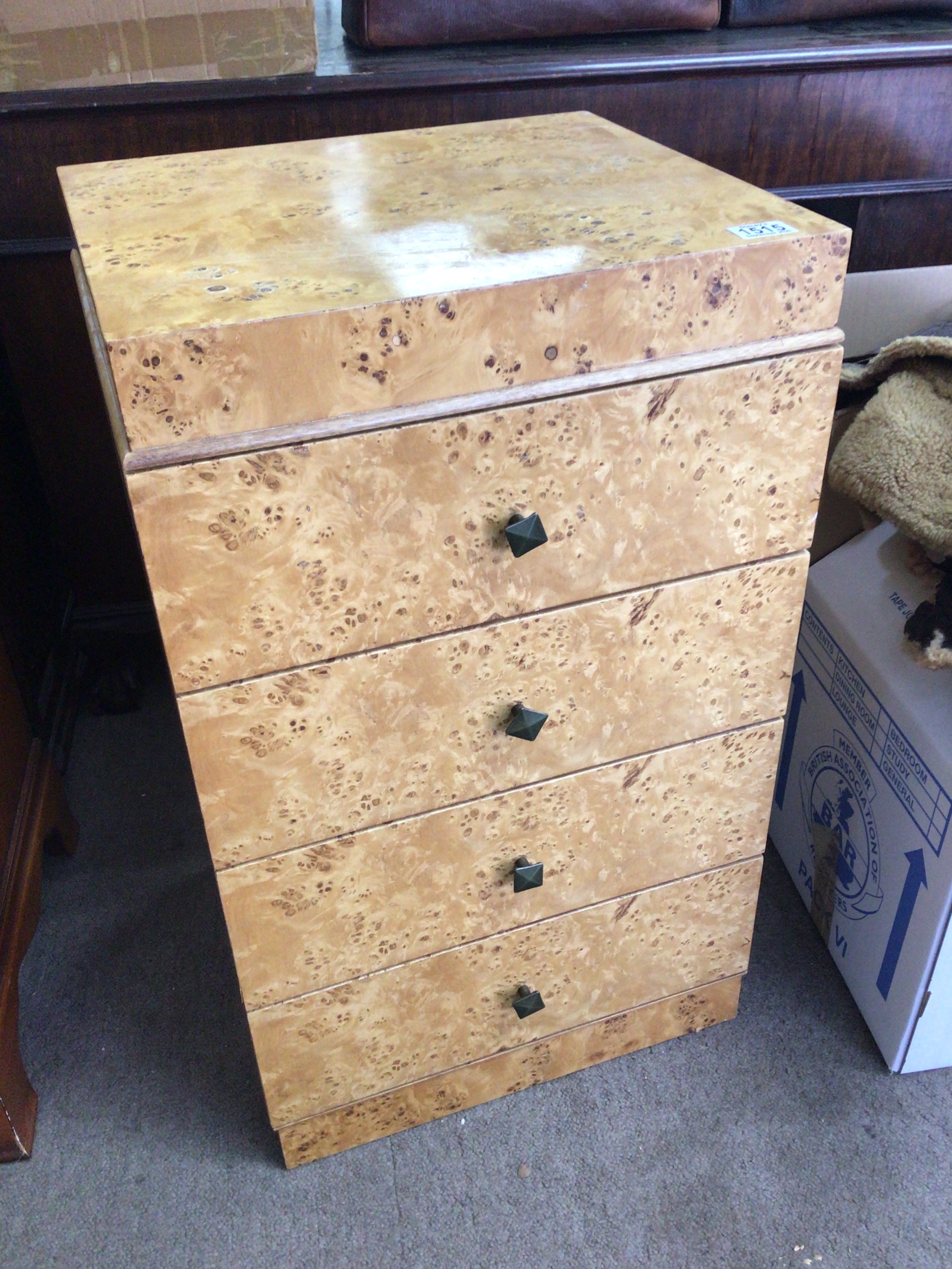 An Art Deco design burr maple flight of drawers with four drawers 35cm wide 