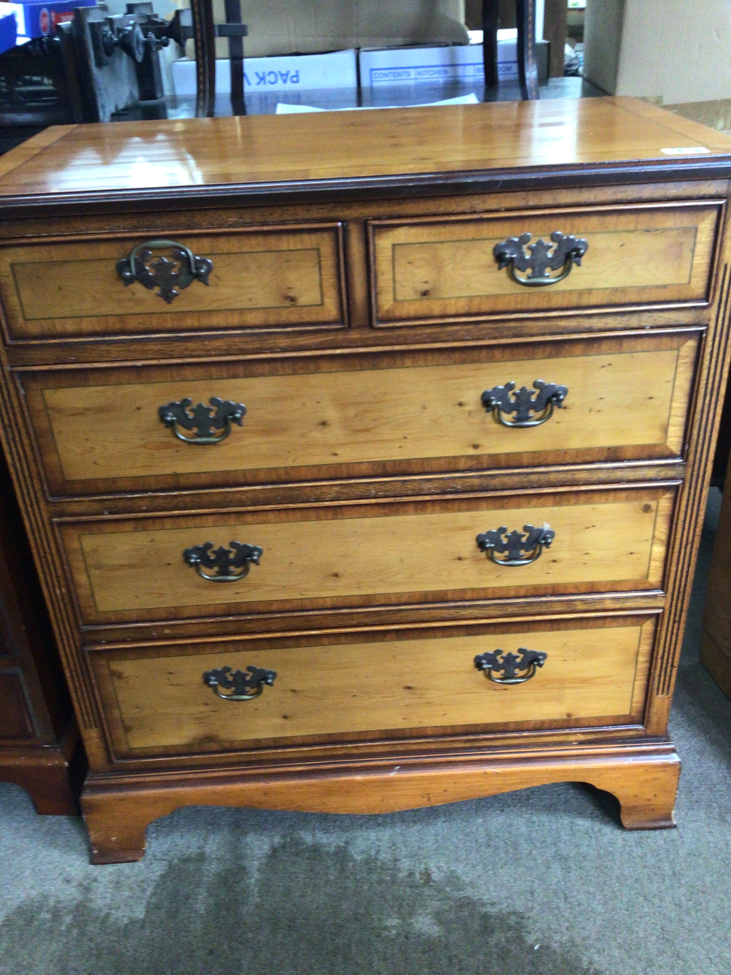A satin walnut chest of drawers with a crossbanded edge two short and three long drawers 67x86cm 