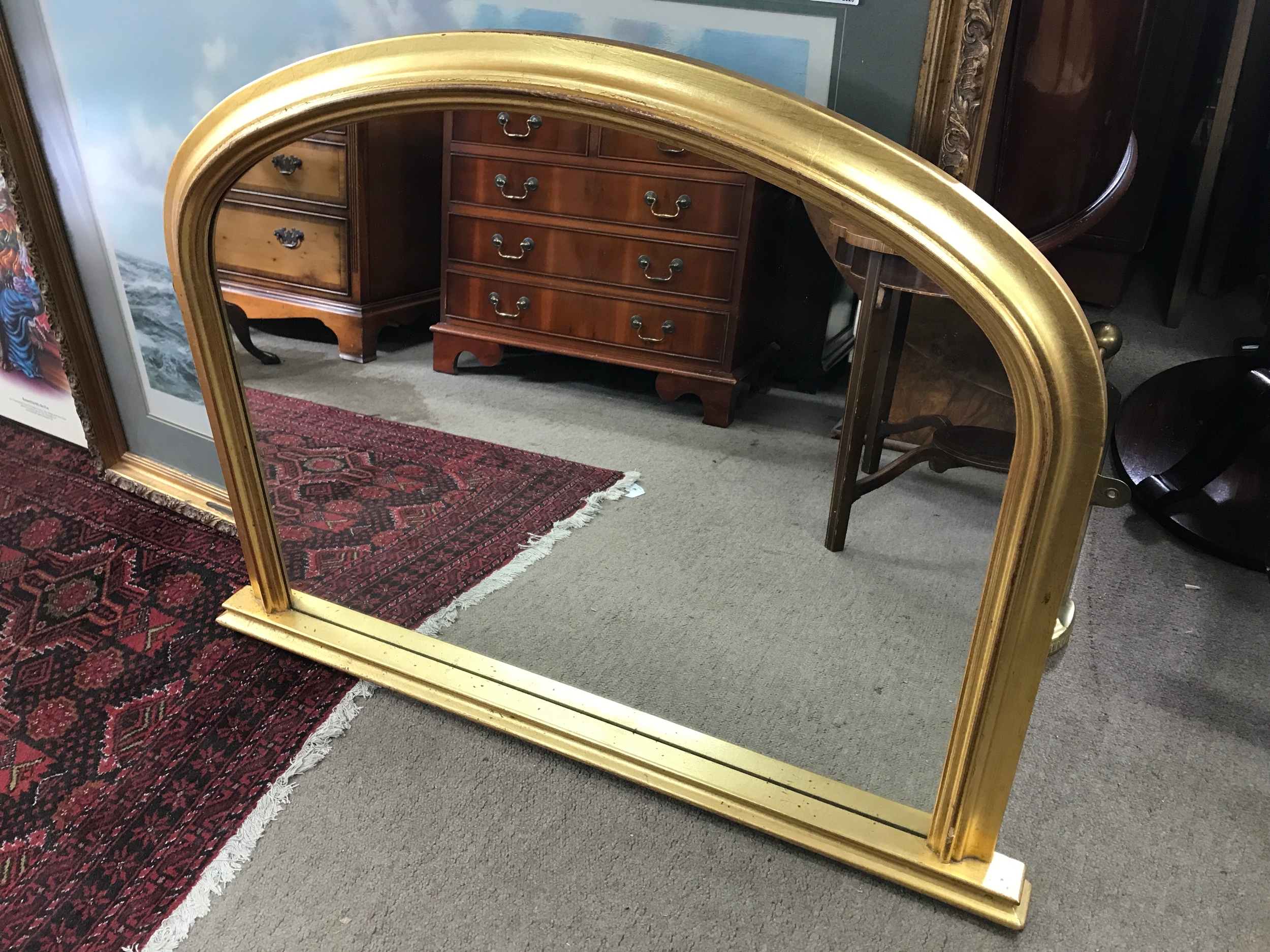 An oval hall mirror. 98x74cm