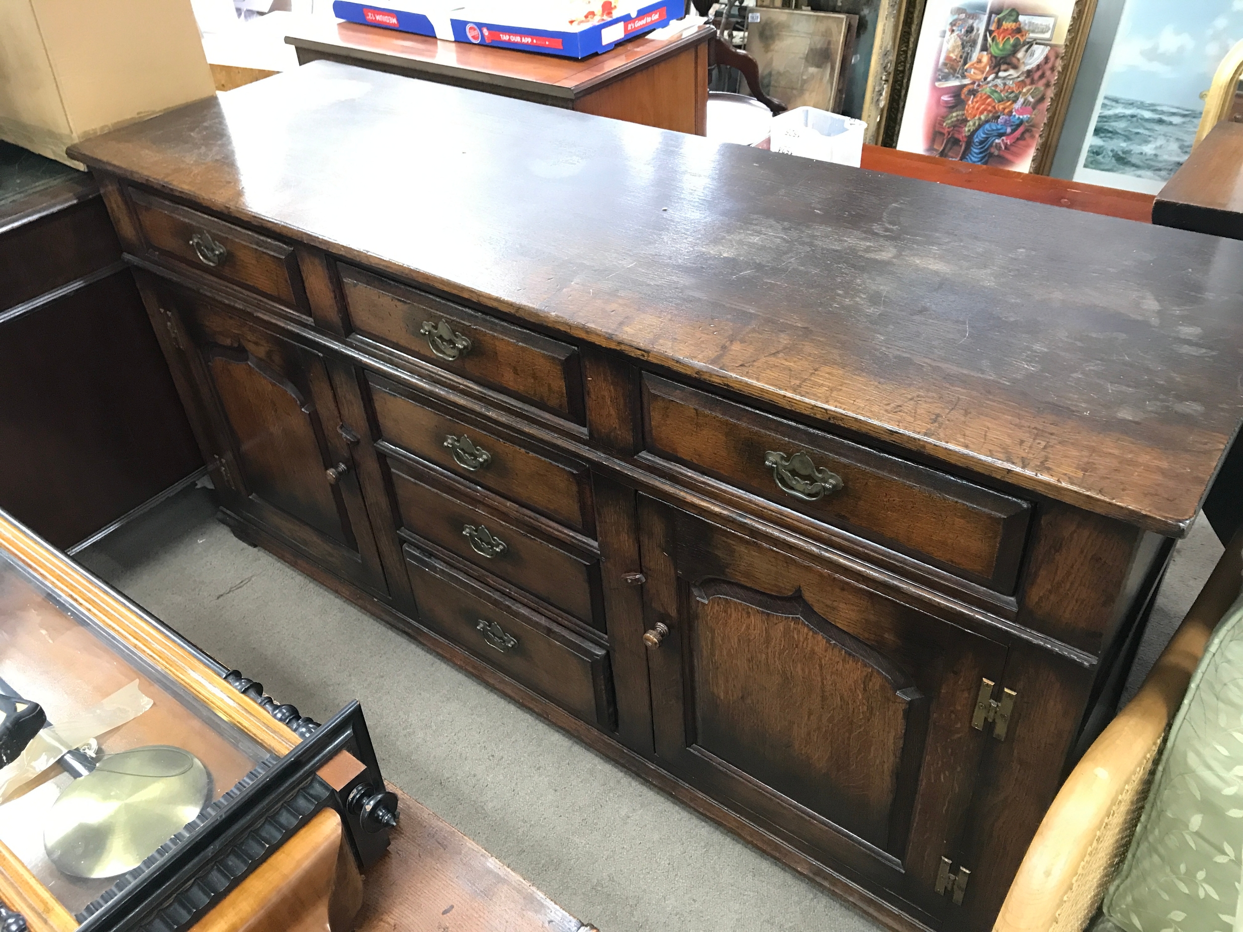 A solid oak sideboard 169cm wide, 84cm tall, 53cm long 