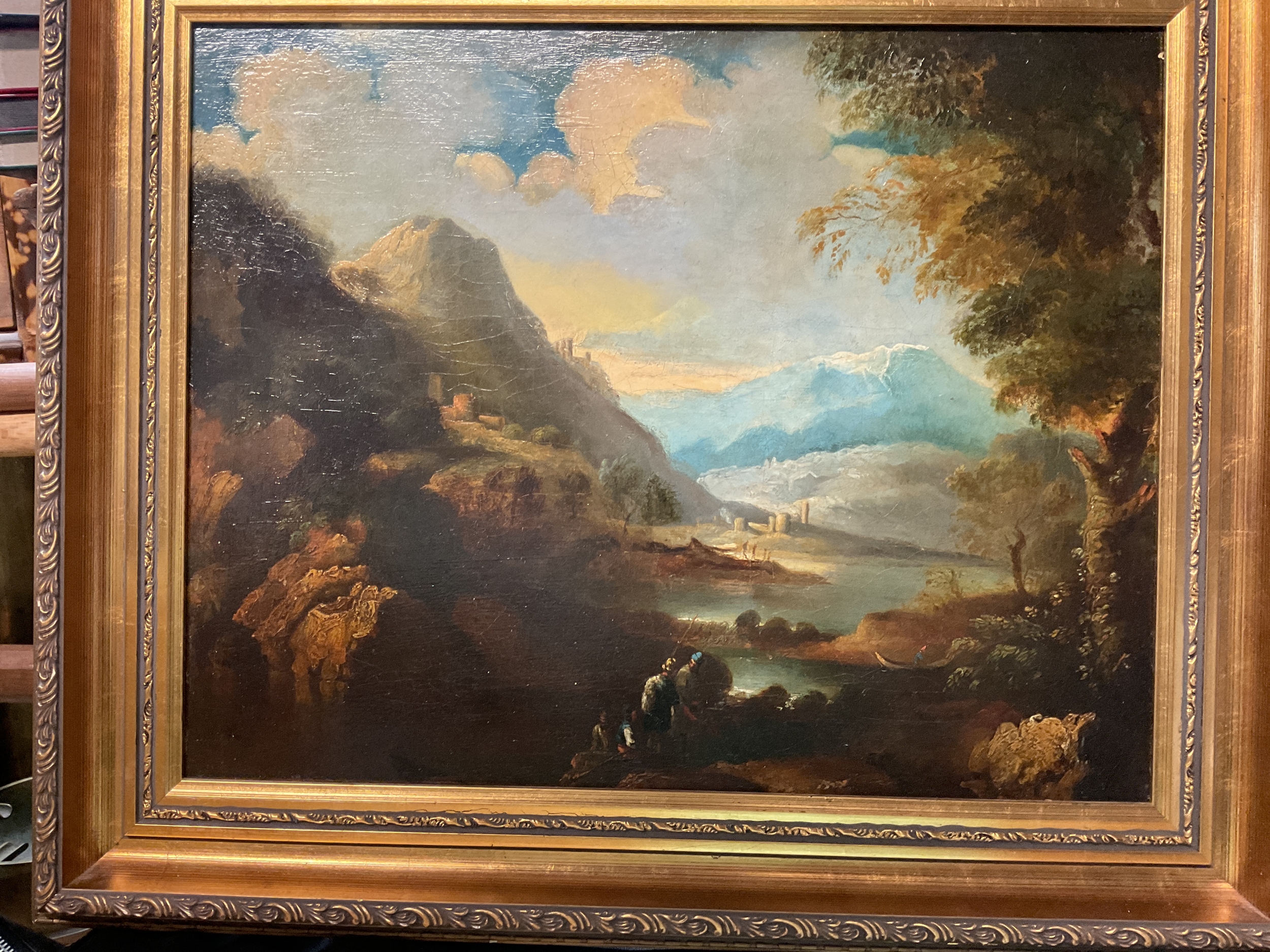 19th C oil on board mountainous lake scene with castle in foreground.no signature, wax seal to verso and Dutch stickers from Rijswijk 34 cm x 43 cm in nice gilded frame.