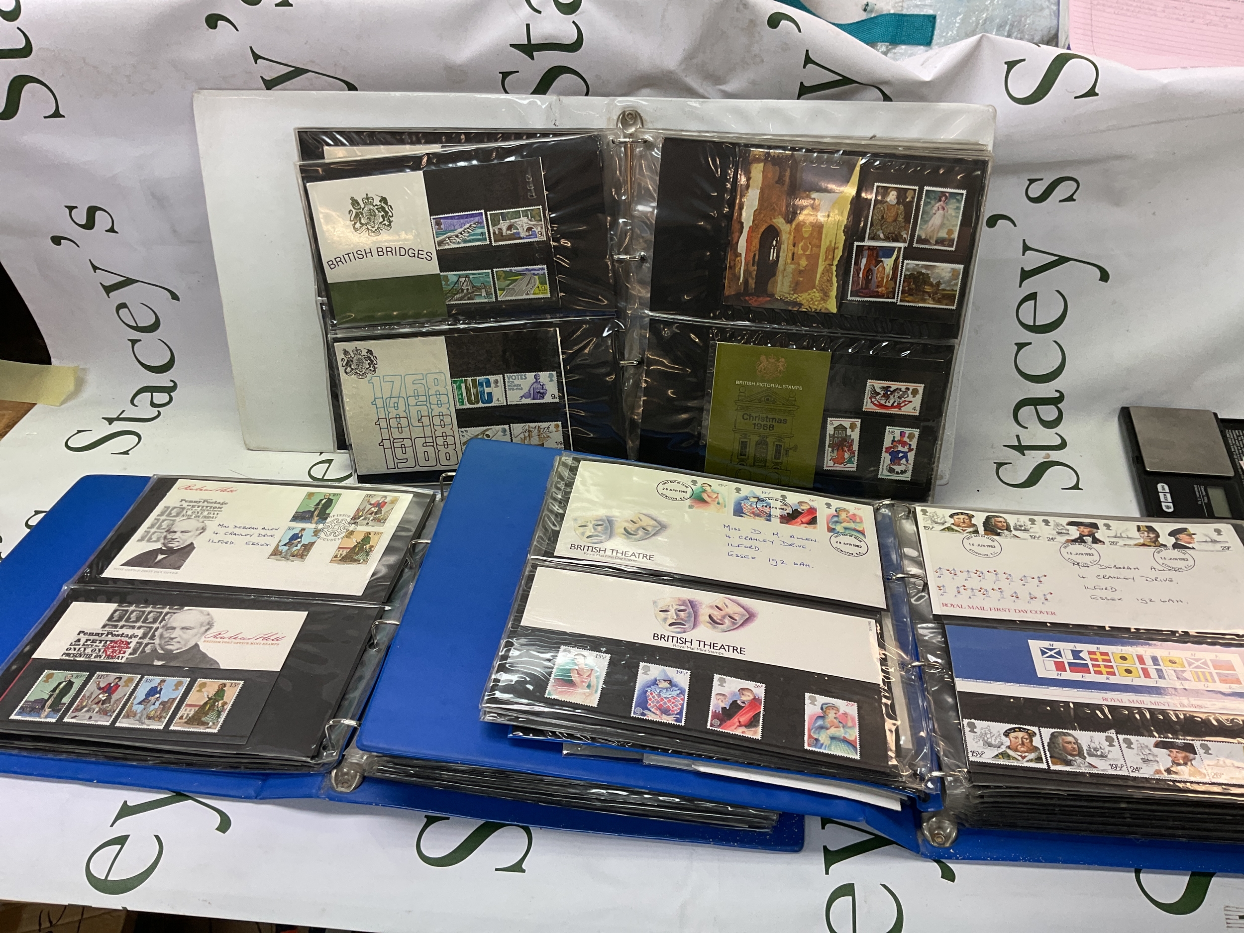 Three albums of clean presentation packs and FDC s from pre- decimal to 1980s.