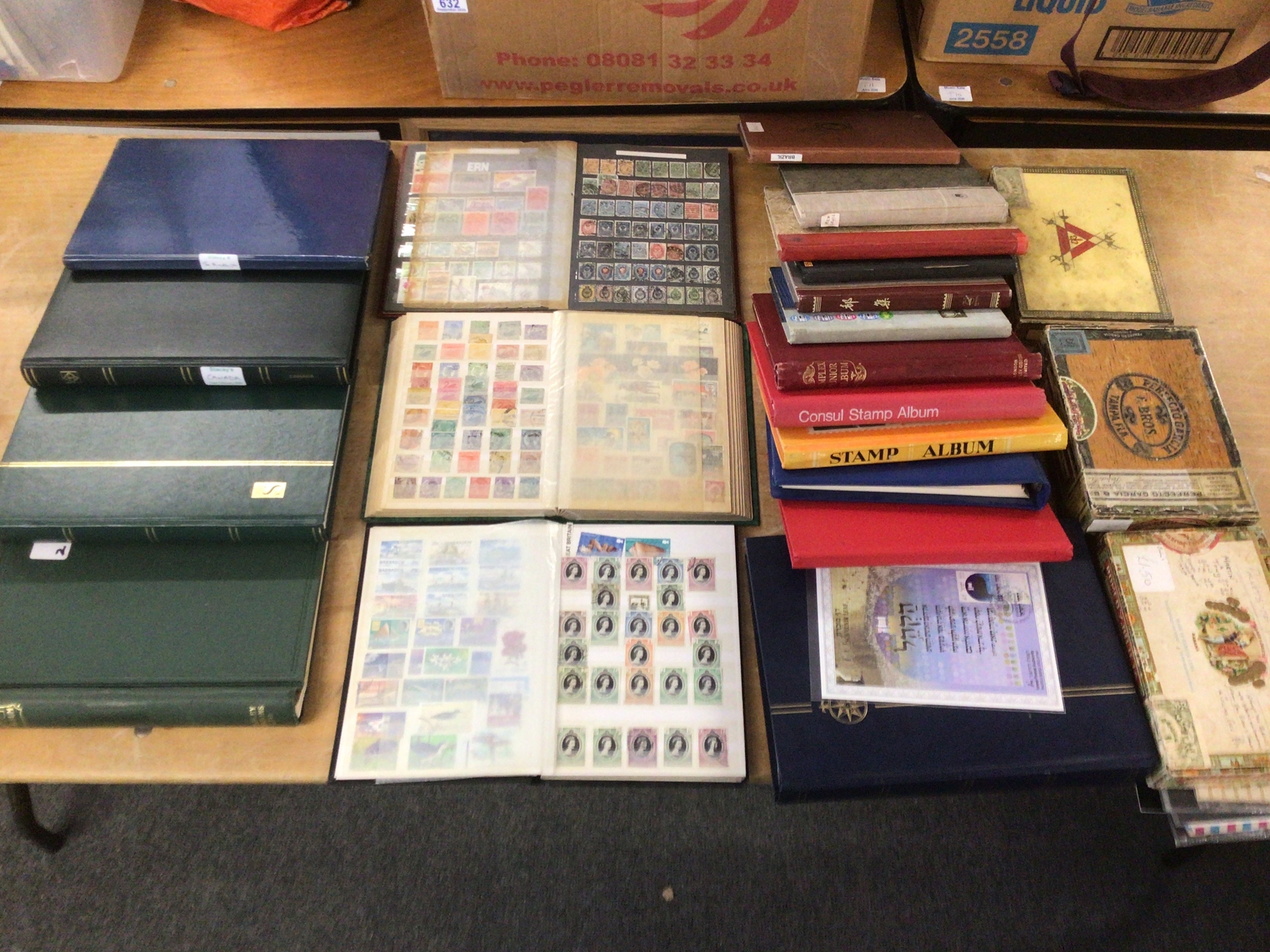 Box of stamp albums, thematic, animals and boats, mixed world, commonwealth and Asia, Canada S America, loose and cigar boxes of odds.early Russian Australian.