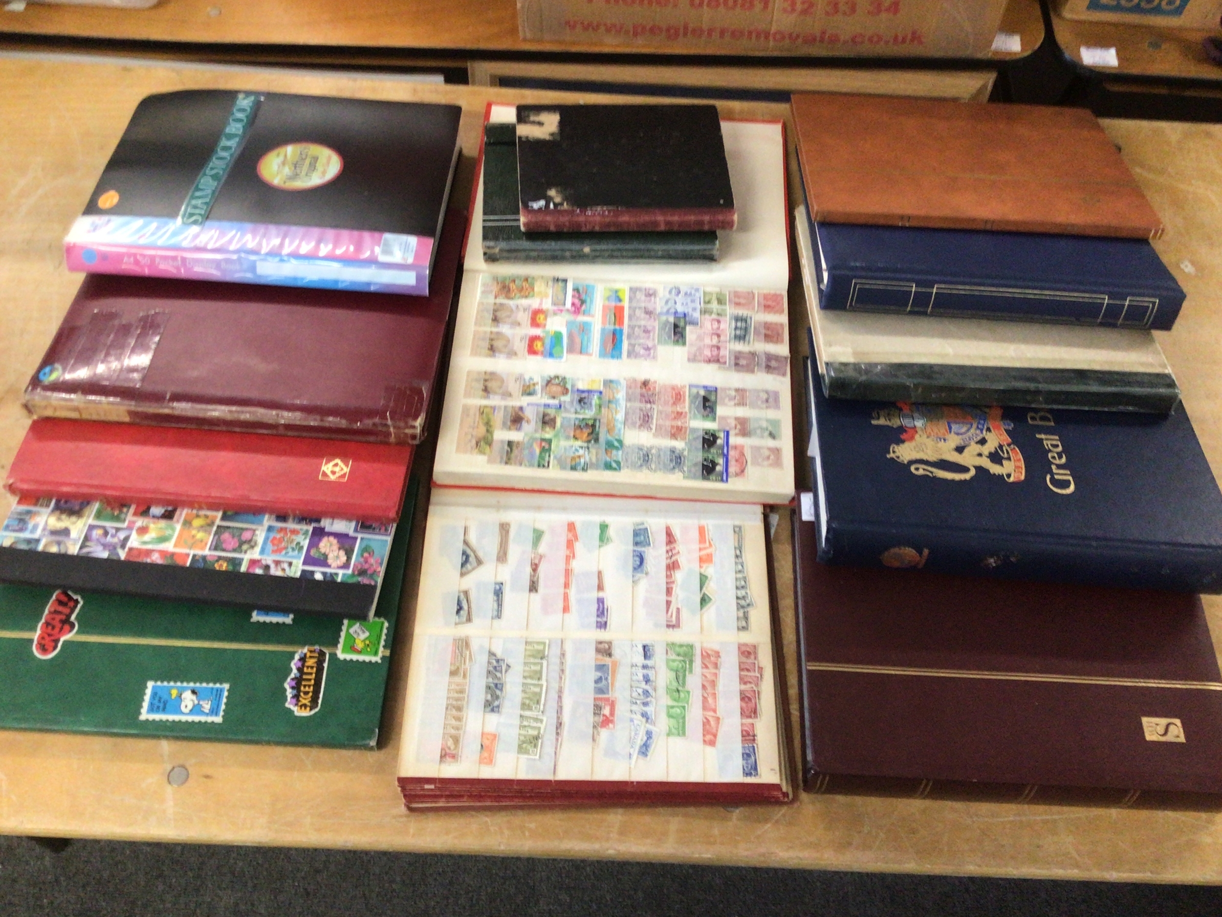14 albums of stamps to inc World, GB, and Commonwealth issues.