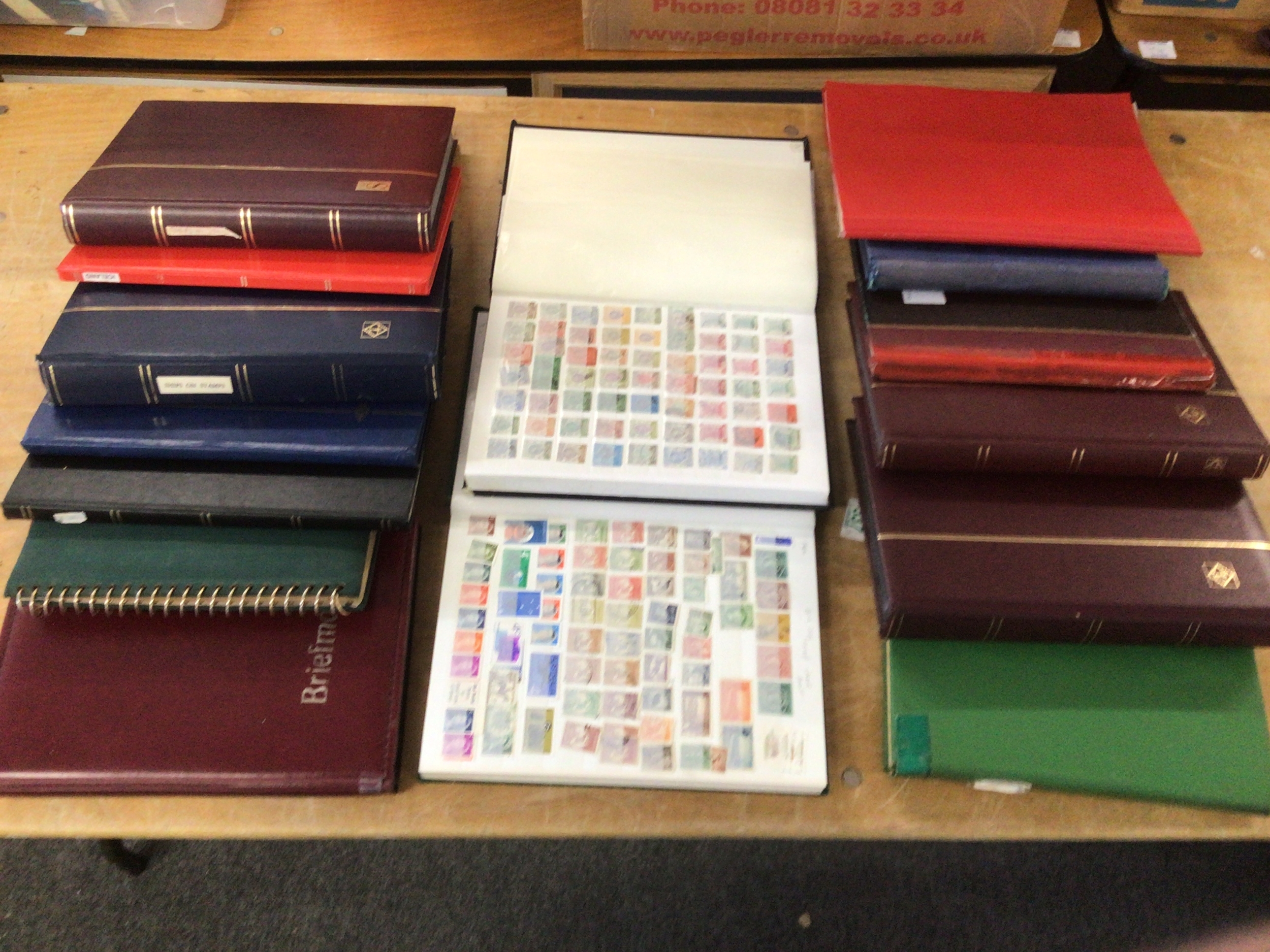 15albums of stamps, VR, GVR, GVIR To present, world and commonwealth issues.