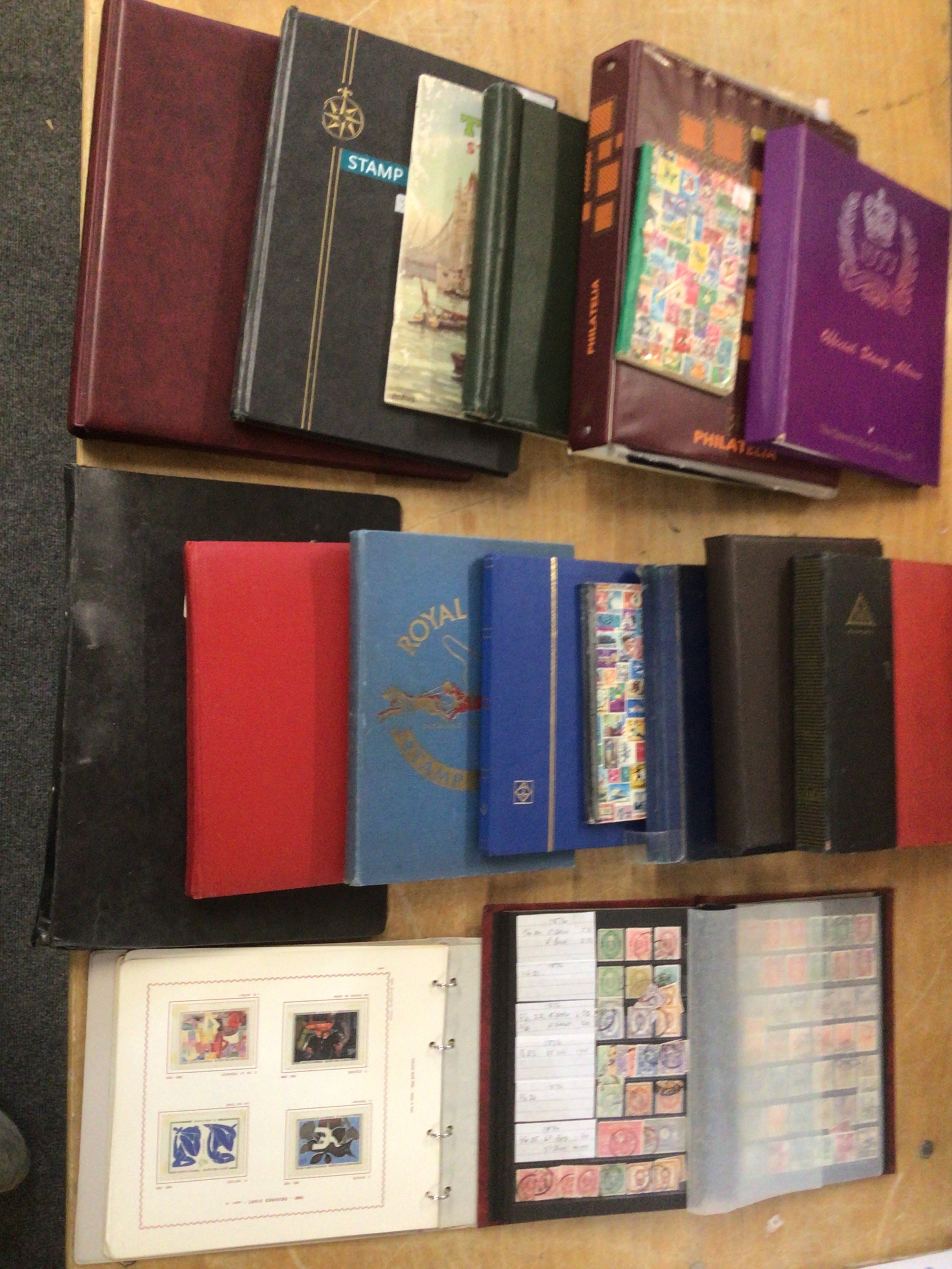 17 albums of stamps tonic French and Japan issues along with world examples 