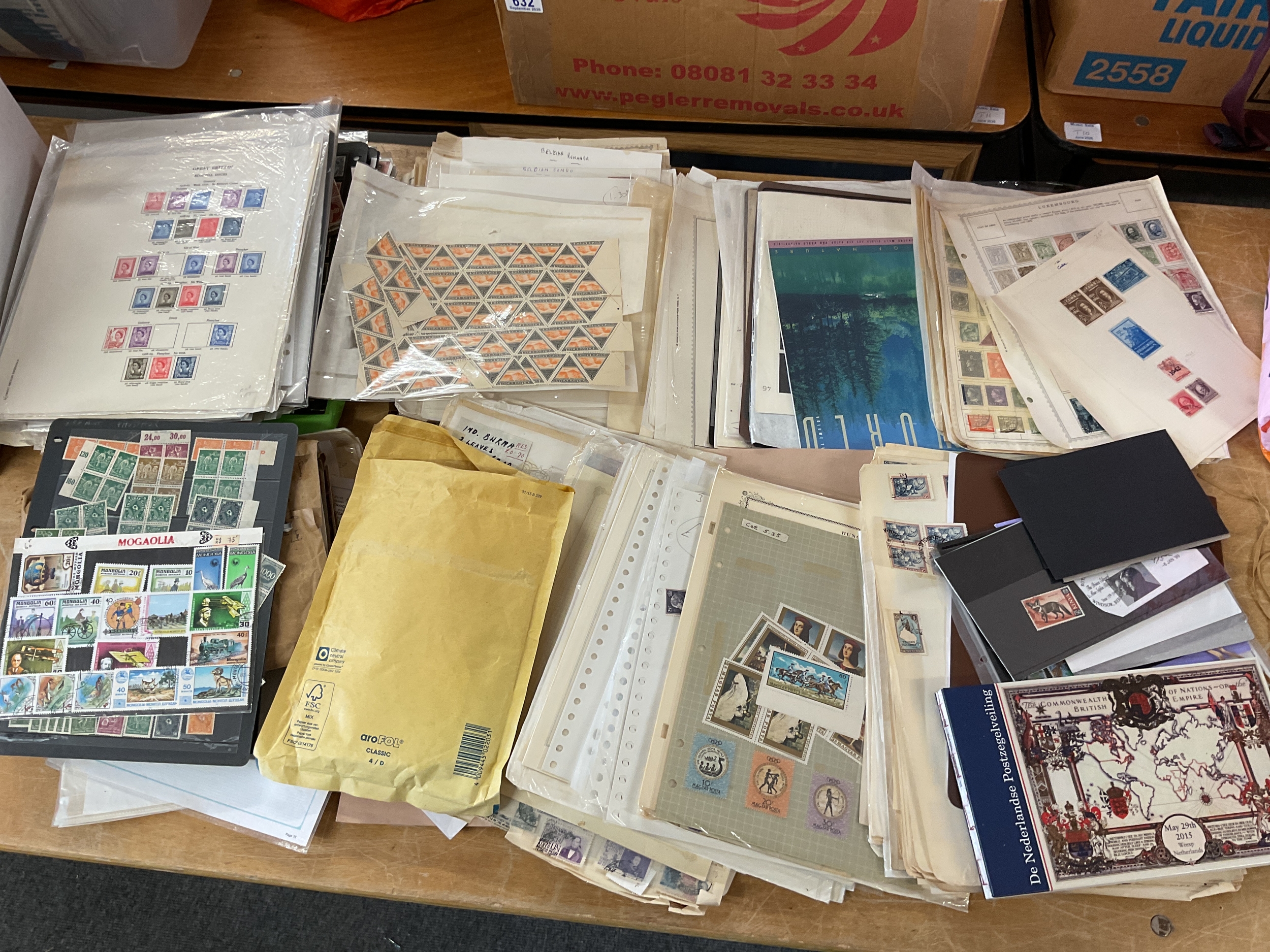 Box of mixed world stamp, definitives, regionals, World and sheets.