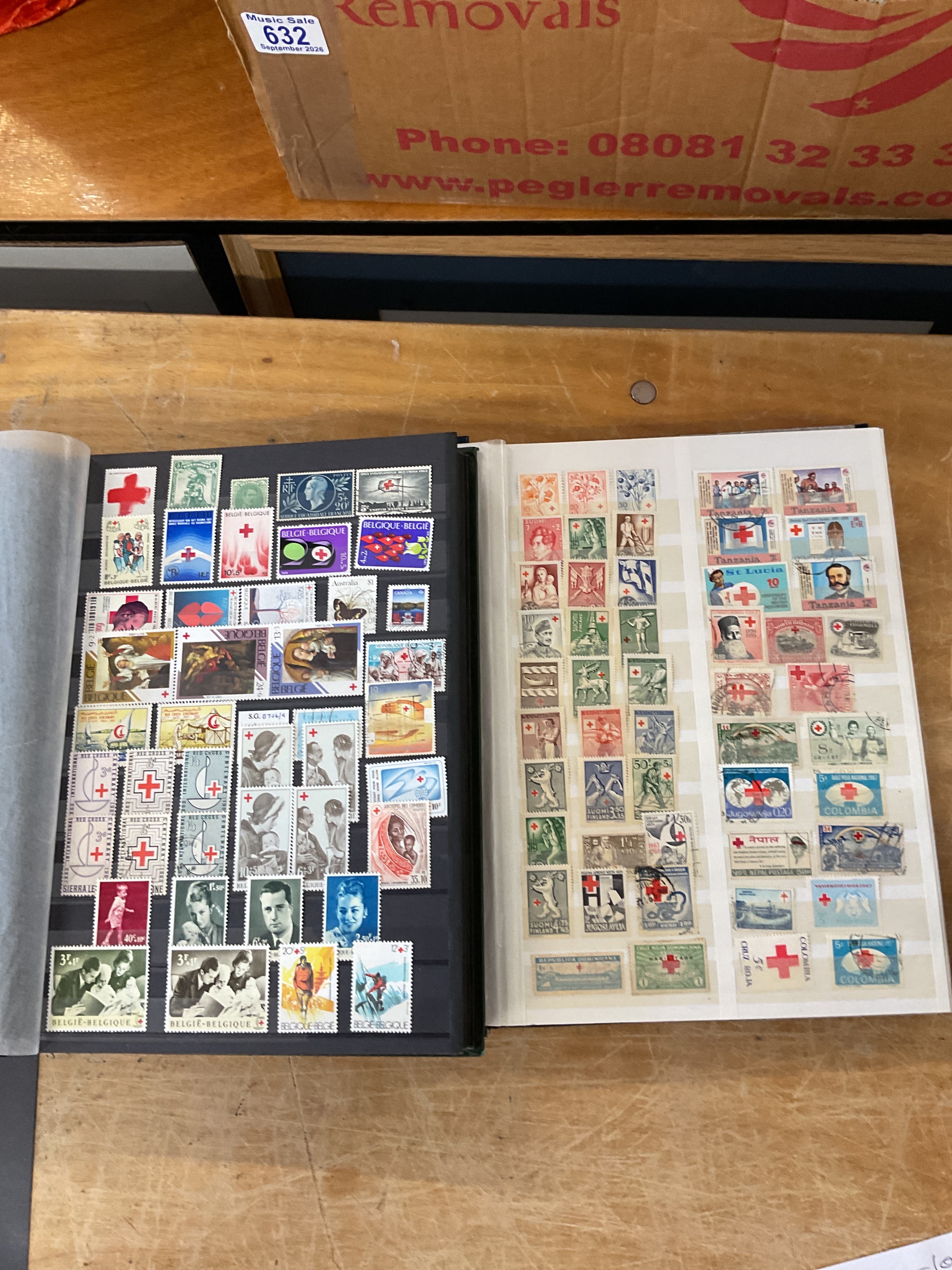 Two large albums of Red Cross thematics, many mint nice clean presentation.