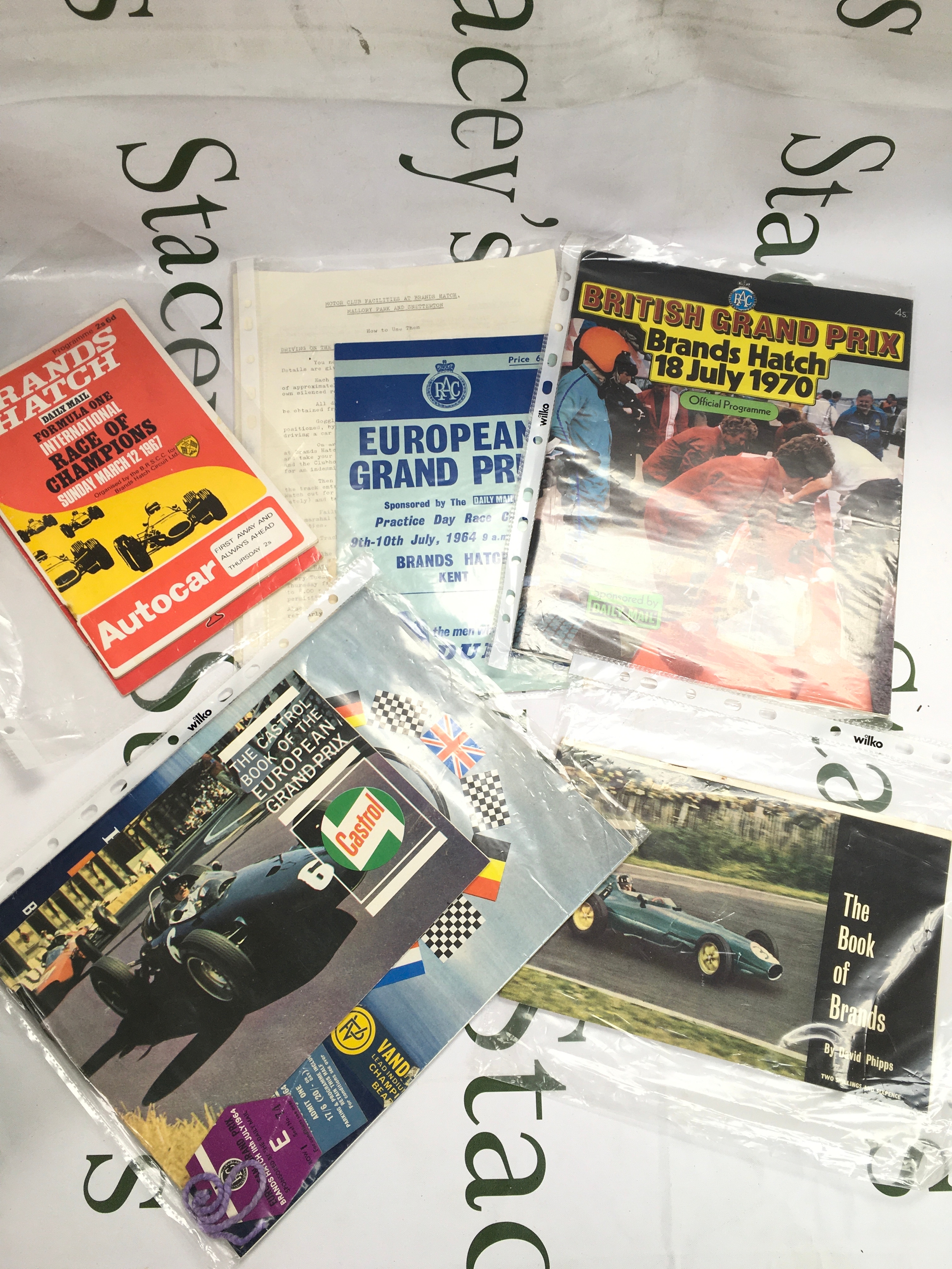 A collection of vintage Brands Hatch race track programmes, tickets and other 