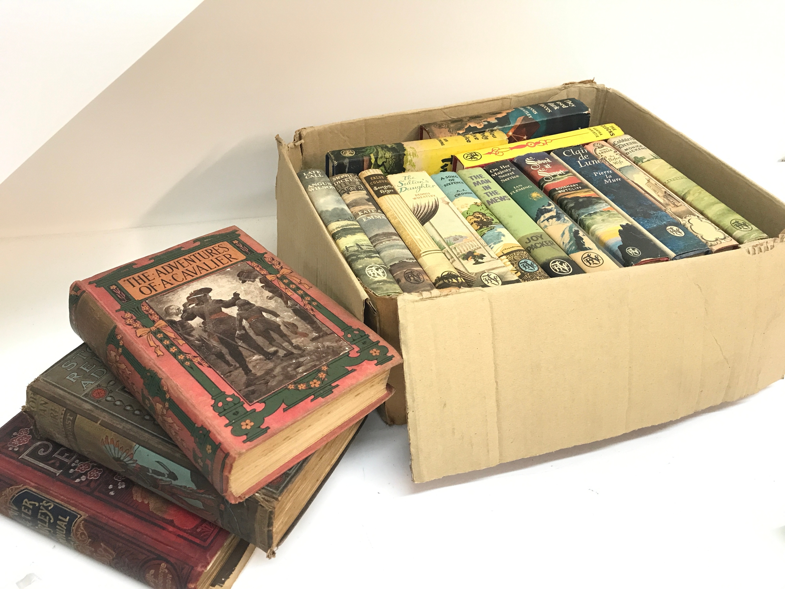 A box of books 1963-64 with dust covers including Ian Fleming You Only Live Twice, On Her Majesty's Service and other titles, three late Victorian/Edwardian books NO RESERVE