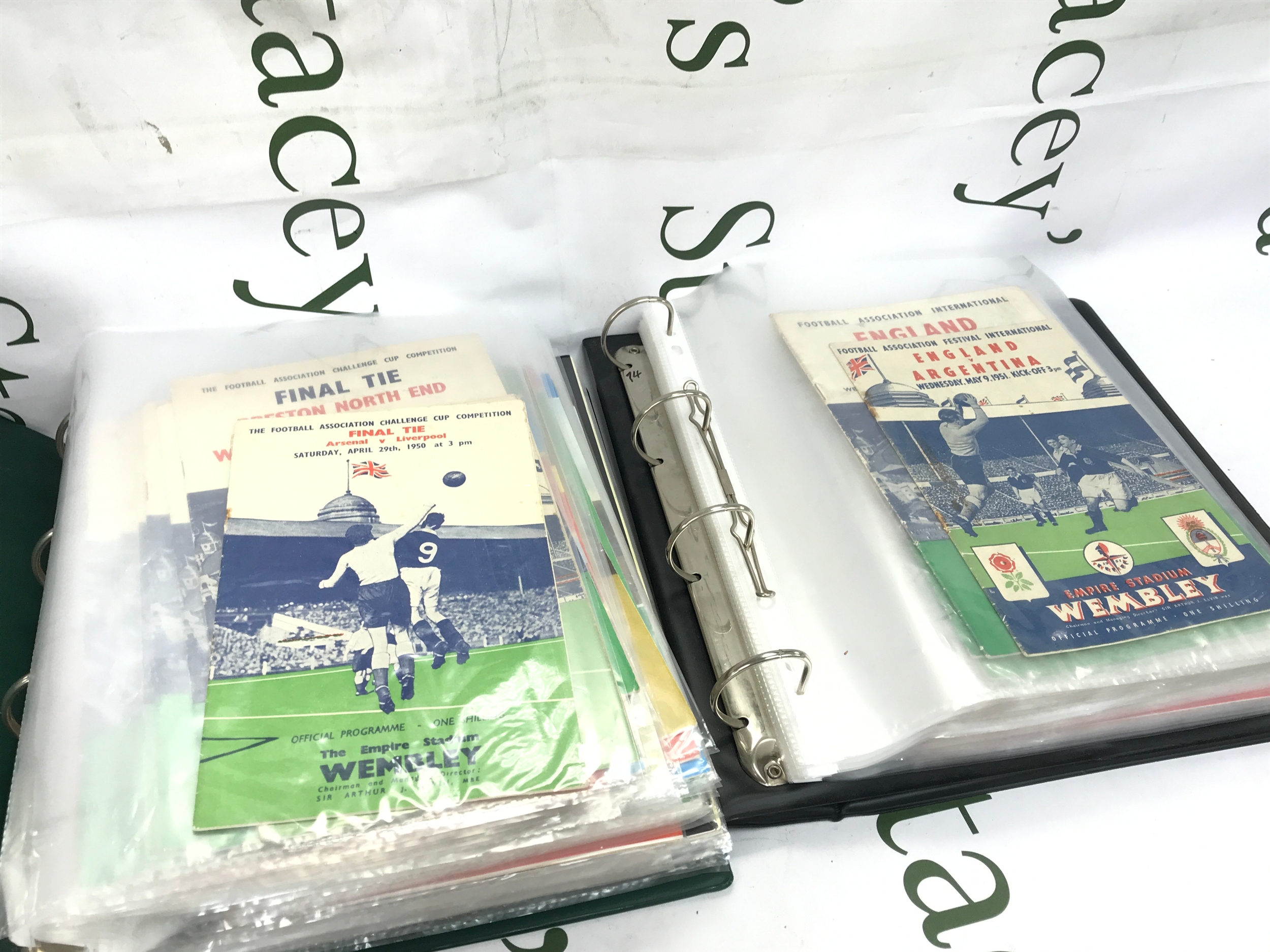 Two folders of England international football programmes from 1951-1990 (75)