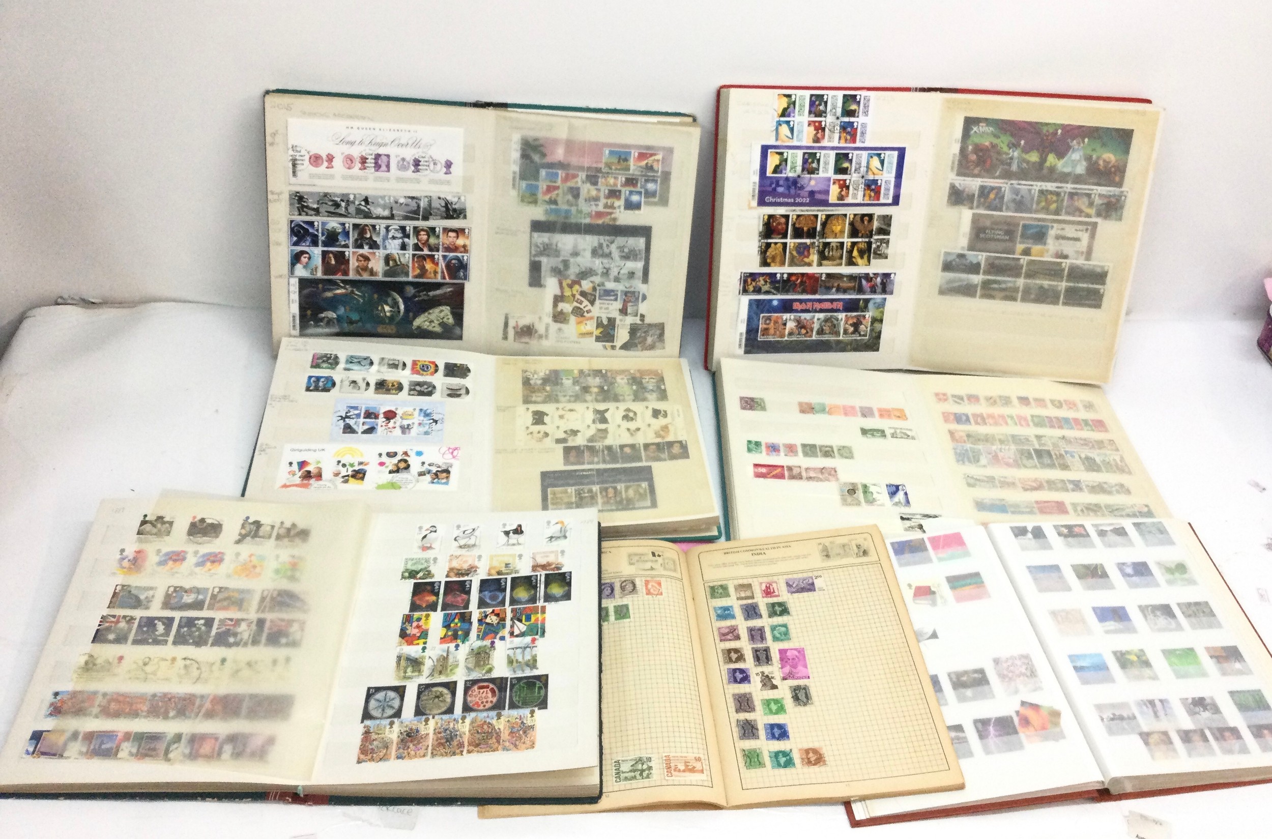 A collection of stamp albums comprising largely 20th century circulated examples
