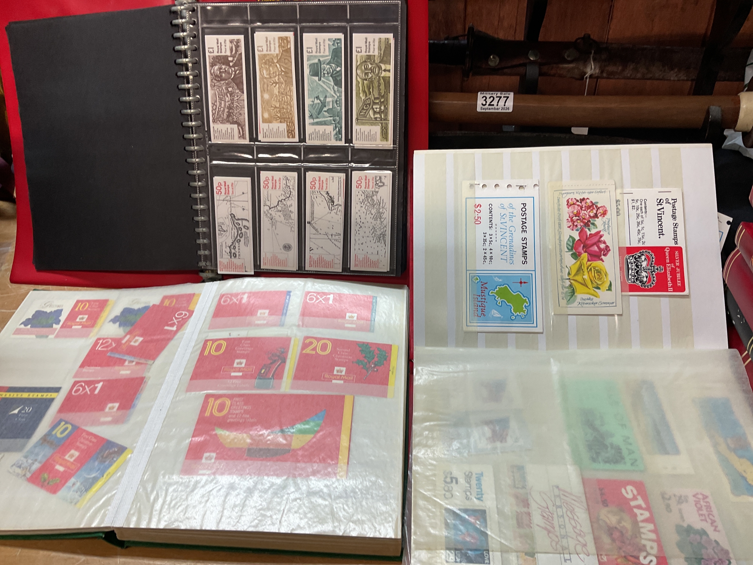 Albums of mint stamp books and mini sheets,