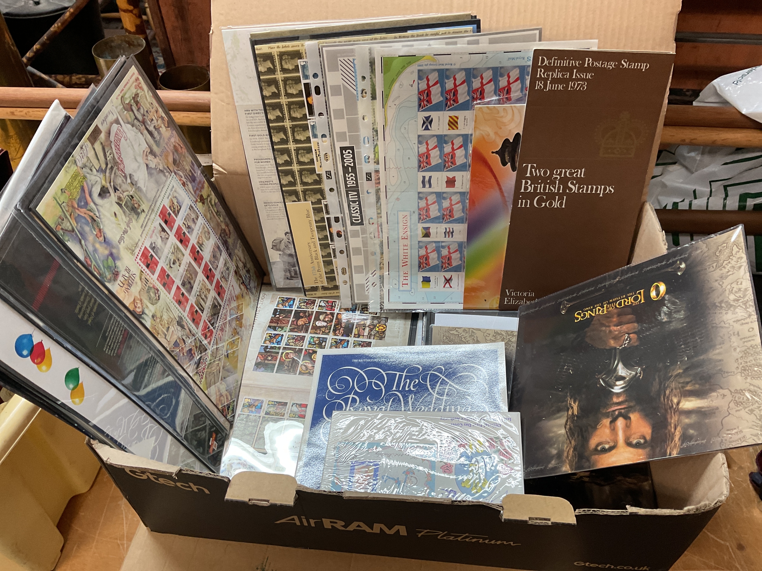Box of smiler sheets and special edition stamps.