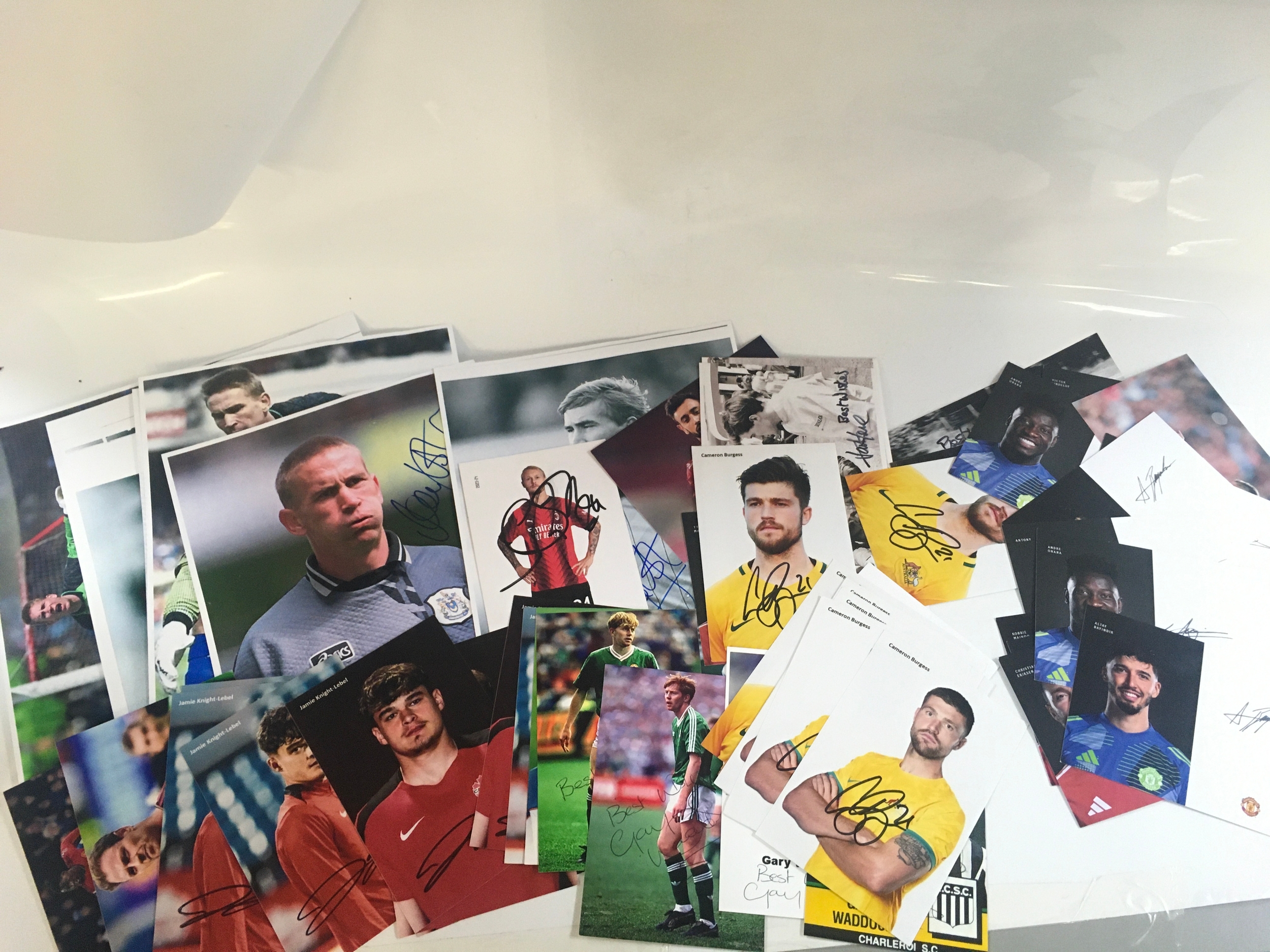 A collection of sports autographs including Football Manchester United players, rugby, Jackie Lewis British formula one driver etc  NO RESERVE
