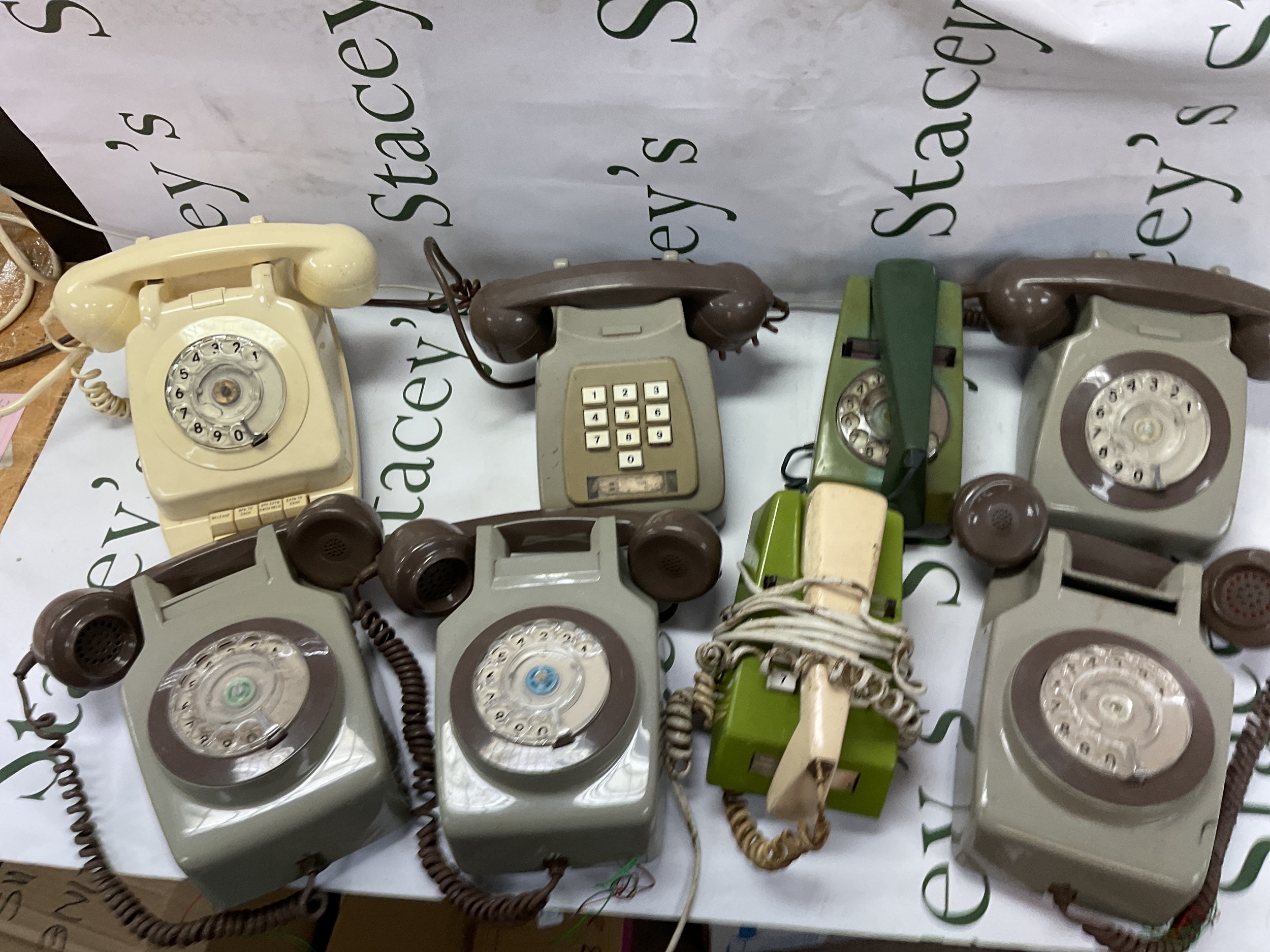 Qty vintage telephones.wall hanging and trim varieties,
