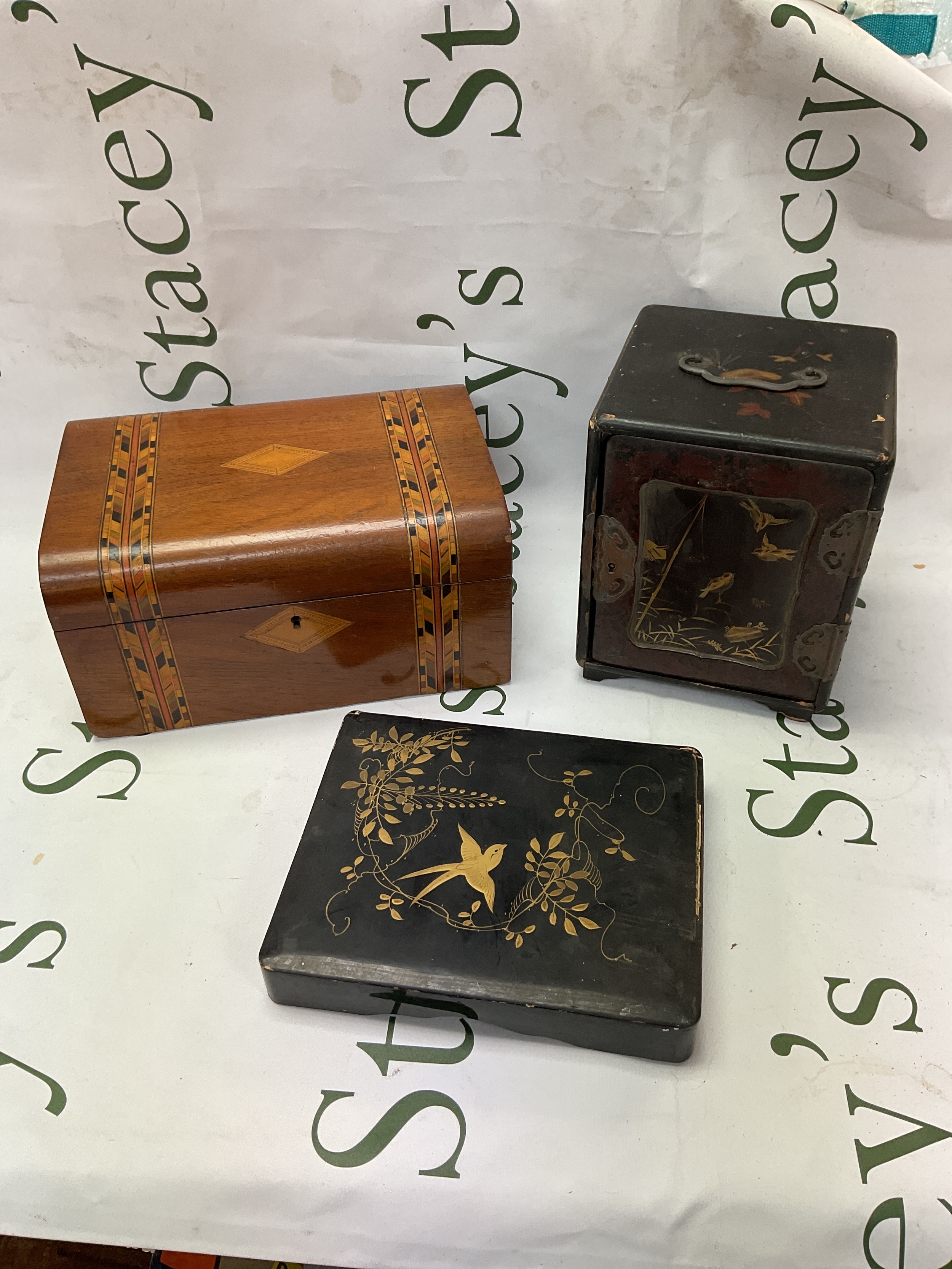 Tunbridgeware box and oriental three drawer box along with gilded lid.