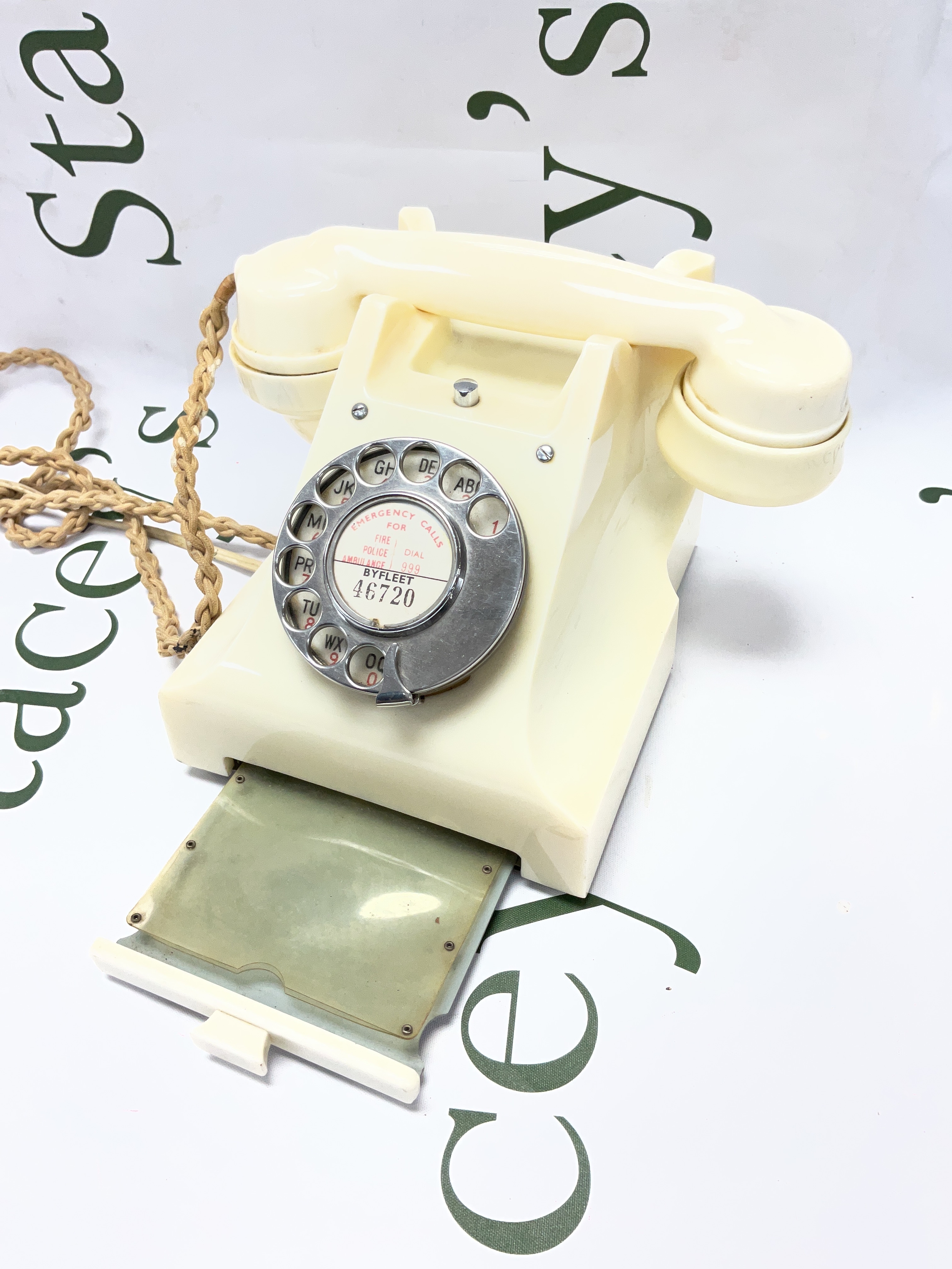 Vintage Ivory phone with drawer.