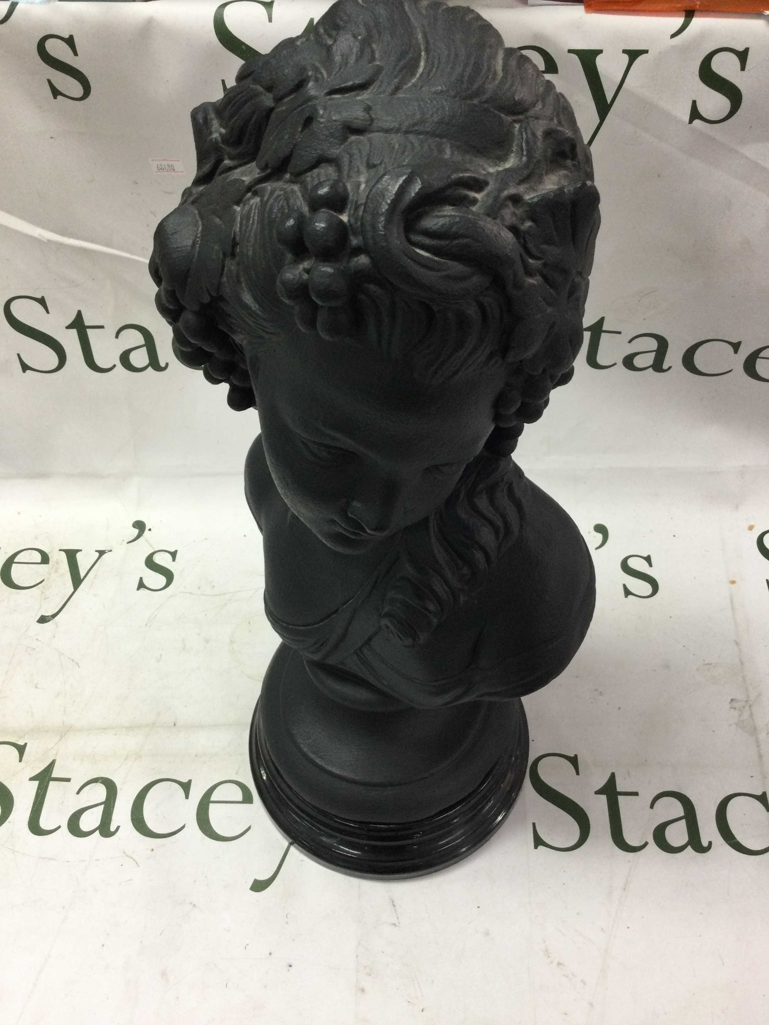 Large black painted bust of a lady with grapes in hair on socle base  NO RESERVE