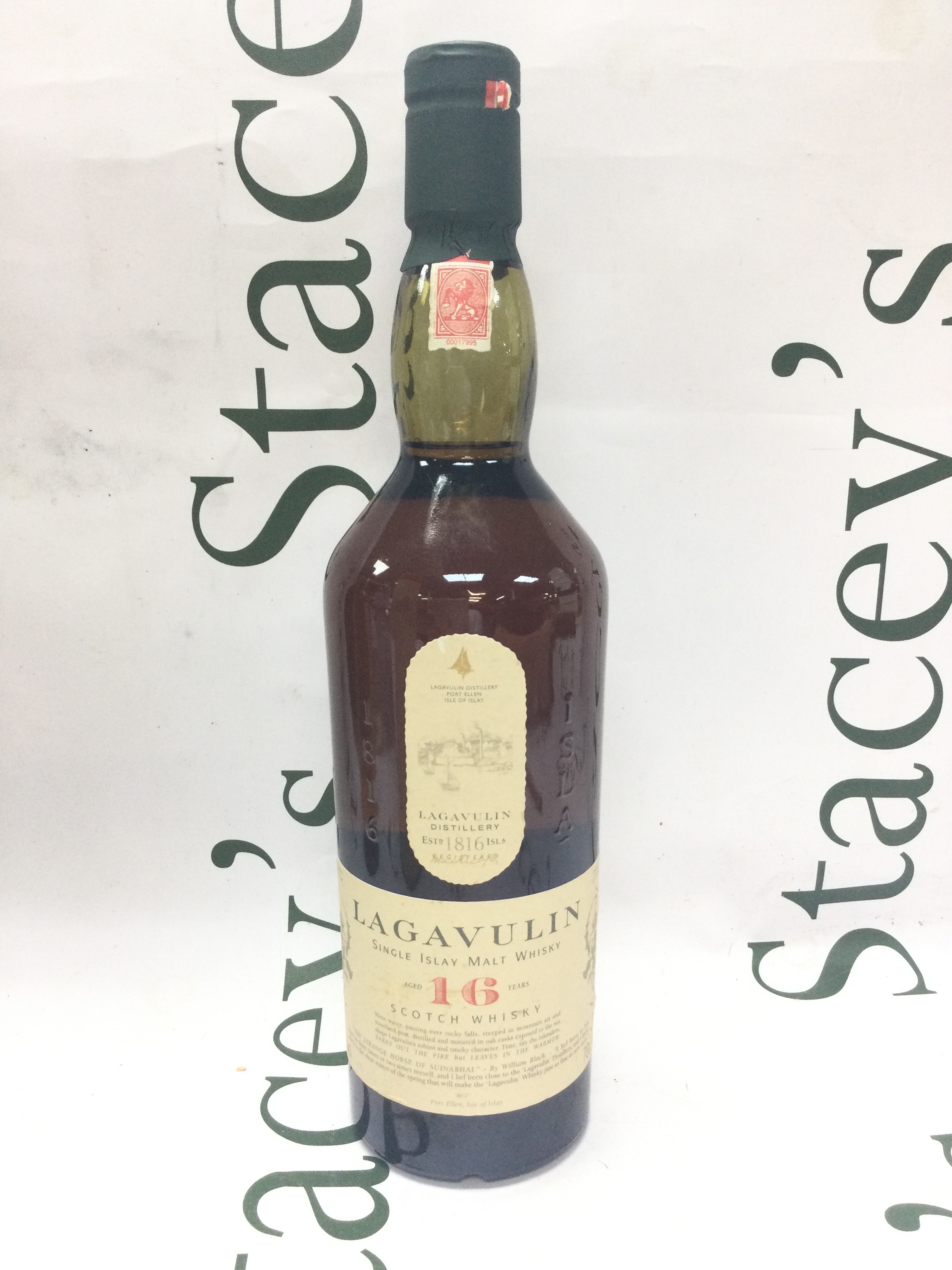 A bottle of lagavulin single islay malt whisky aged 16 years